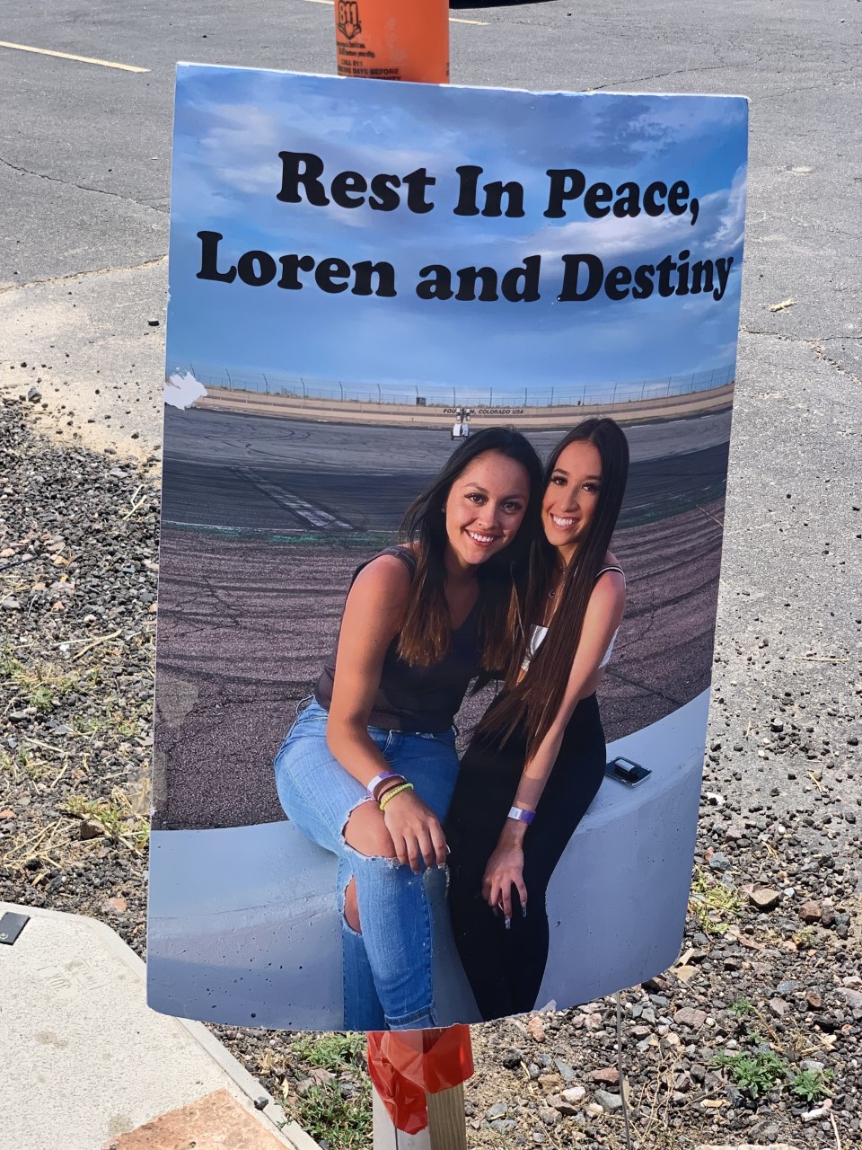 This tribute picture of Loren Harris, 18, (left) and Destiny Zimmerman, 17, both of Parker, at the corner of Parker Road and East Plaza Drive, Parker. The girls died there June 29 after a high-speed car crash. (DENNIS HUSPENI/THE DENVER GAZETTE)