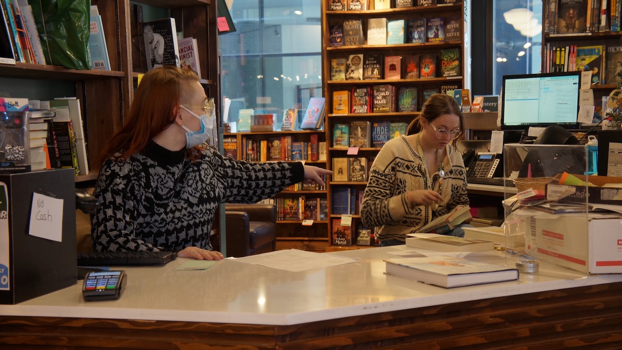 Gigi Geyer (left) and Shannon Jennings work the upstairs desk at Tattered Cover. Geyer has worked at TC for five years, while Jennings has been there 1.5 years. (Alex Edwards, The Denver Gazette)