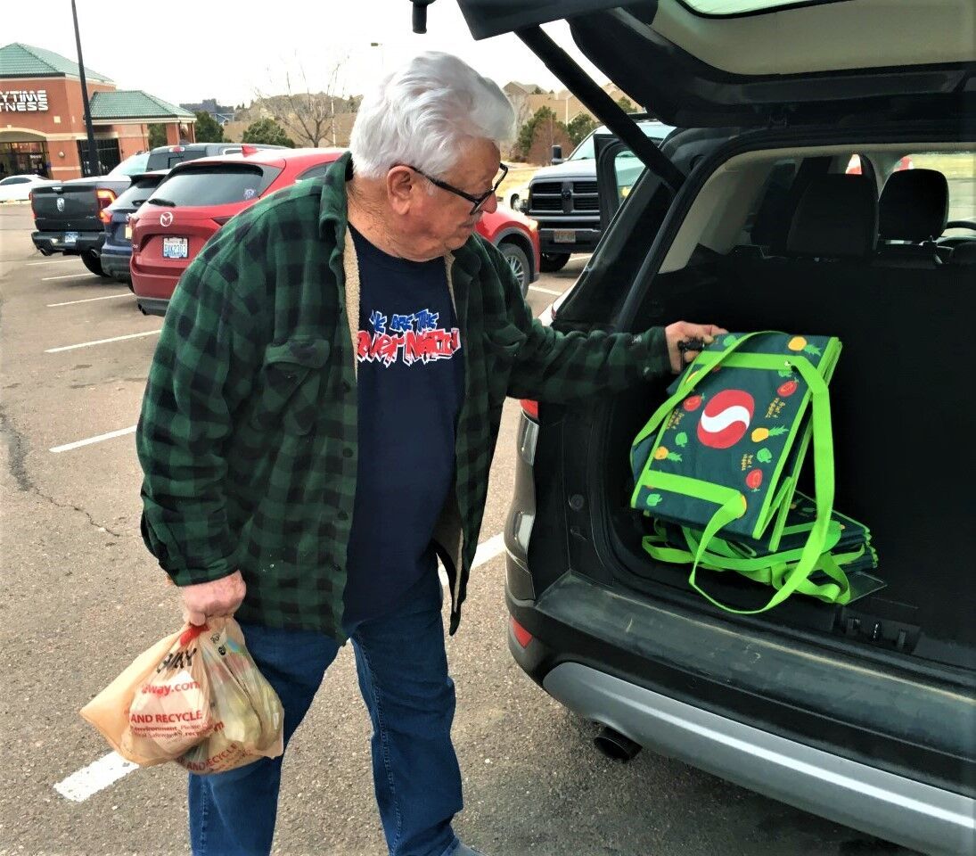 Safeway shopper Tom Cook prepared for the first phase of the state plastic-bag law in December 2022. (rich laden, gazette file)