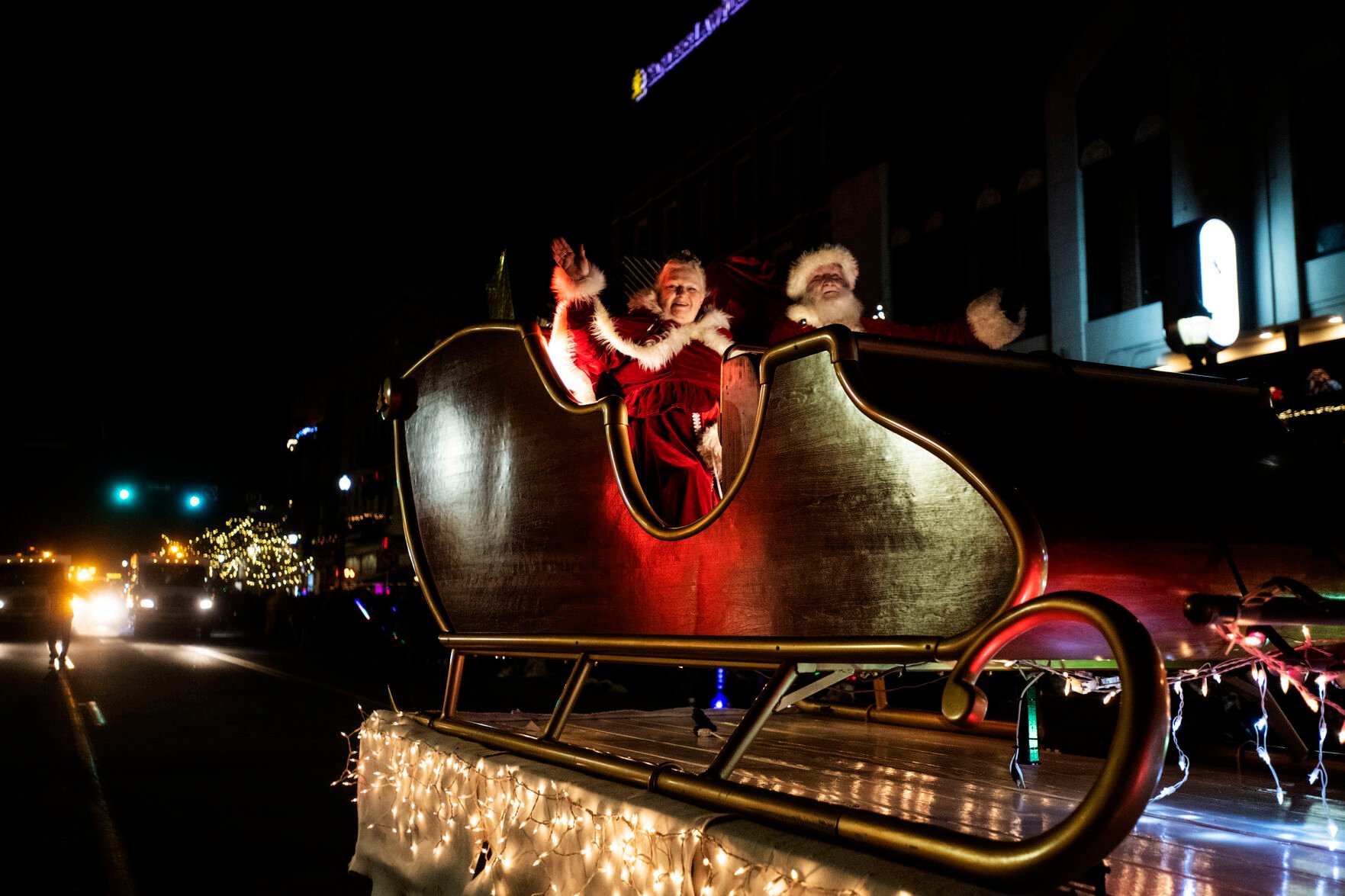 Santa and Mrs. Claus during the 38th annual Festival of Lights parade in downtown Colorado Springs on Saturday, Dec. 4, 2021. Thousands of attendees lined the sidewalks of Tejon Street to watch the “Songs of the Season” 2021 theme parade floats and performers glowing with lights. (The Gazette) (Chancey Bush/ The Gazette)