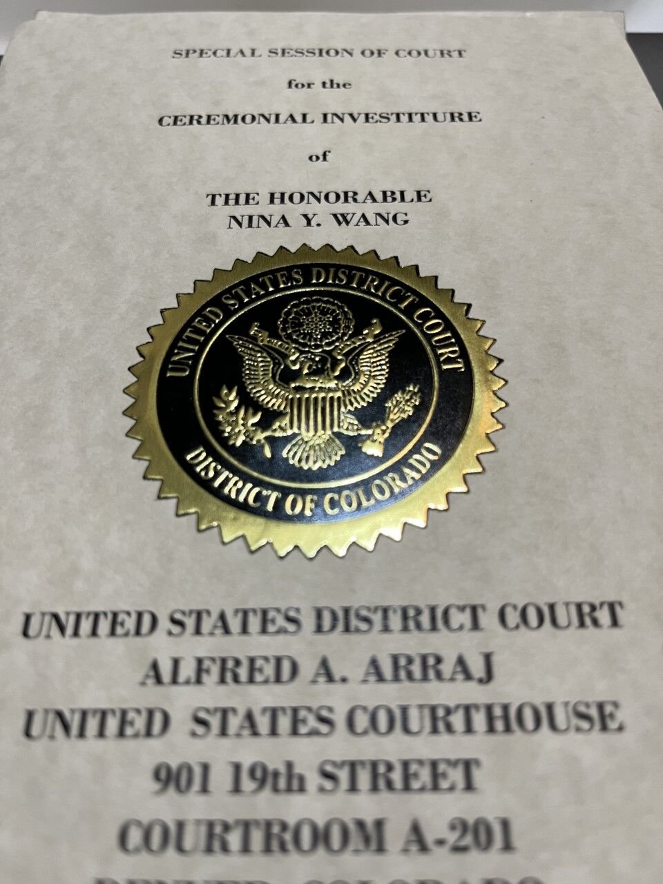 The program for the formal swearing-in ceremony of U.S. District Court Judge Nina Y. Wang on Dec. 9, 2022.