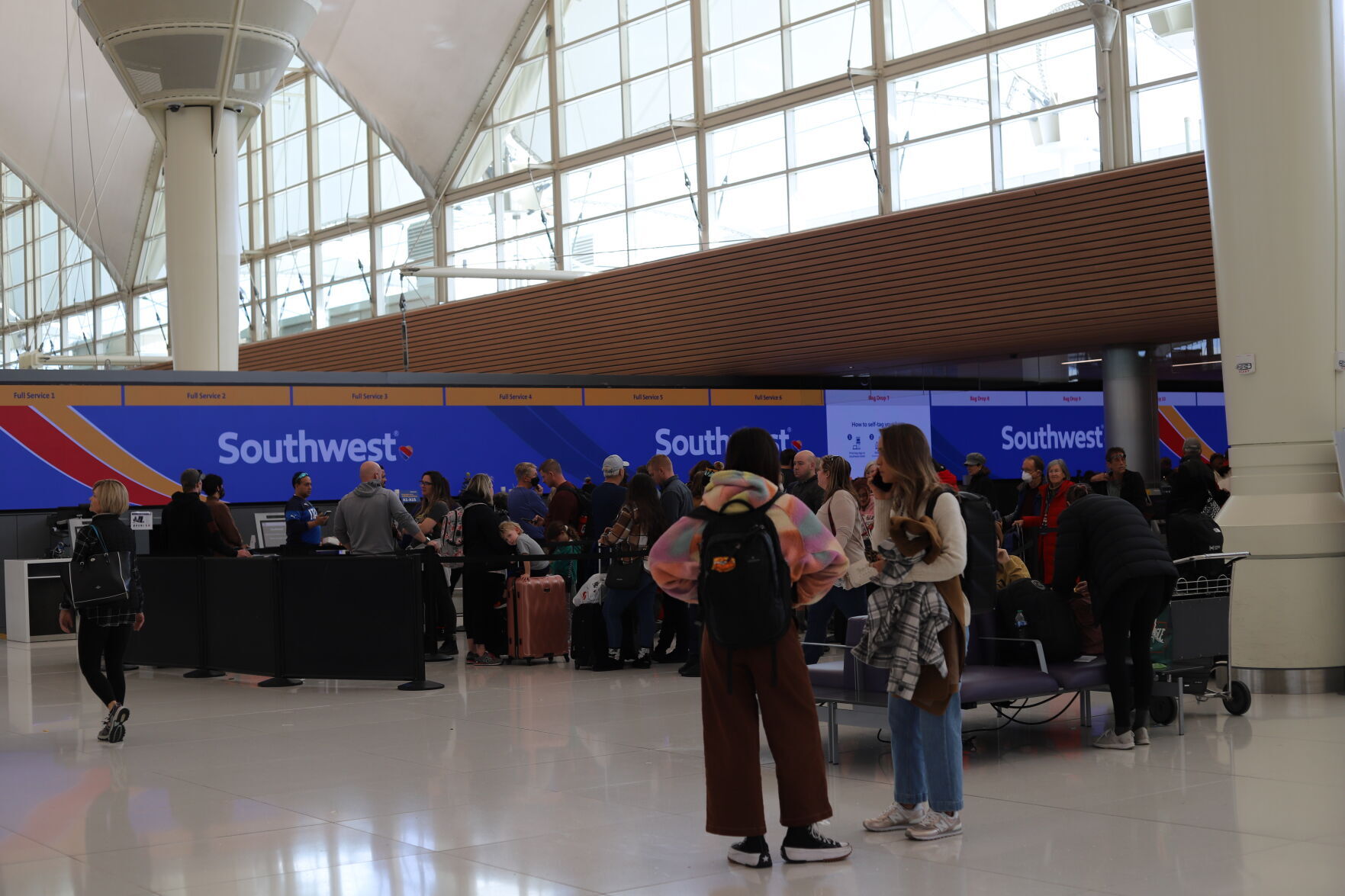 Travelers in line at the Southwest Airlines ticket counter at Denver International Airport Tuesday, Dec. 27, 2022. (KYLA PEARCE/THE DENVER GAZETTE)