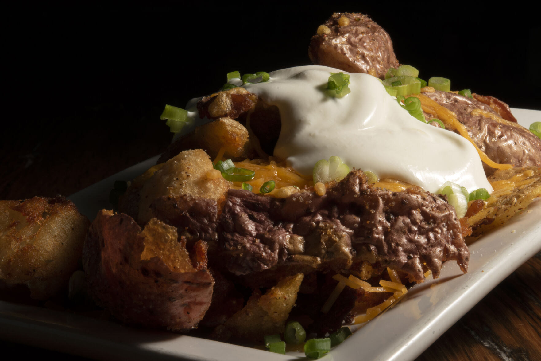 Loaded potatoes at Summa Restaurant. (Jeff Kearney, special to the gazette)