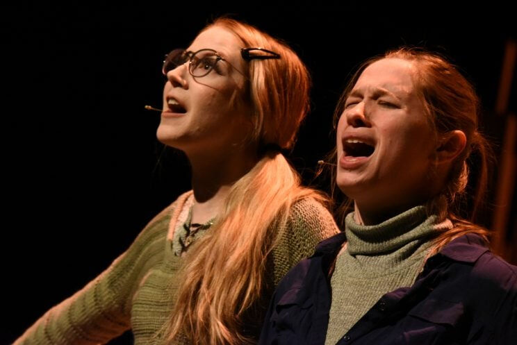 Visual description: A tight photo of Katelyn Kendrick as Percy with Sam Barrasso as Shelby in Phamaly Theatre's 'The Spitfire Grill.' (MICHAEL ENSMINGER/PHAMALY)