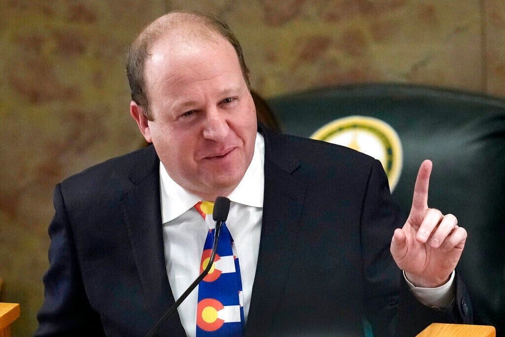 Colorado Gov. Jared Polis delivers his State of the State address to lawmakers assembled in the House of Representatives chamber in the State Capitol, Tuesday, Jan. 17, 2023, in Denver. (AP Photo/David Zalubowski) (David Zalubowski)
