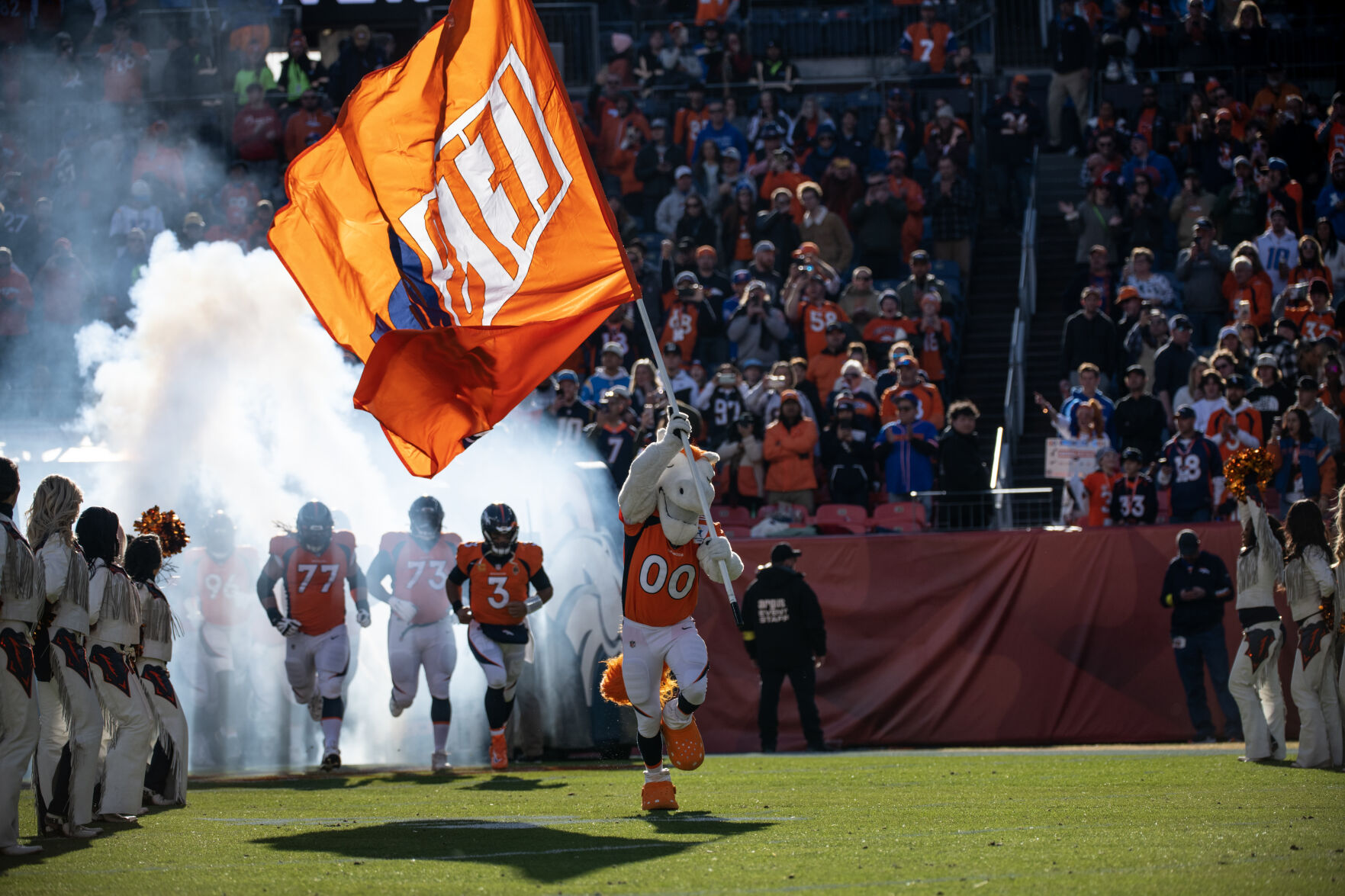Denver Broncos mascot Miles leads the team onto the field at the start of a NFL game on Sunday, Jan. 8, 2023 at Empower Field at Mile High in Denver. (Parker Seibold, The Gazette) (Parker Seibold)