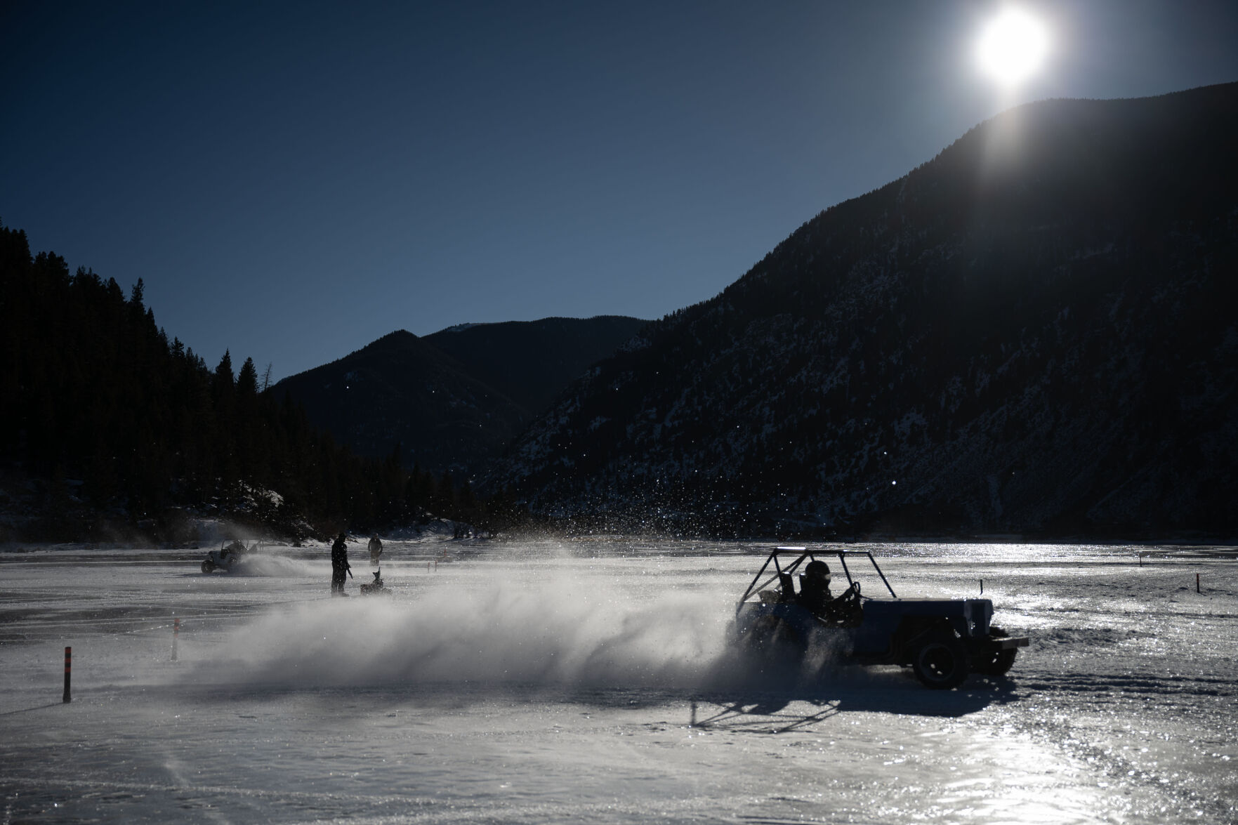 Men’s Competition Cheaters drivers Lee Bashline, right, and Jason Johansen compete during the first day of the Our Gang 4 Wheelers ice racing club’s 2023 racing season on Saturday, Jan. 7, 2023, in Georgetown, Colo. The Cheater division is named for the tires used, which have 1 1/2 inch sharpened bolts protruding from them. (Timothy Hurst/The Denver Gazette) (TimHursttim.hurst@gazette.comhttps://secure.gravatar.com/avatar/aca82bd62b4ee425c598527cd6faa1b1?d=mm&r=g)