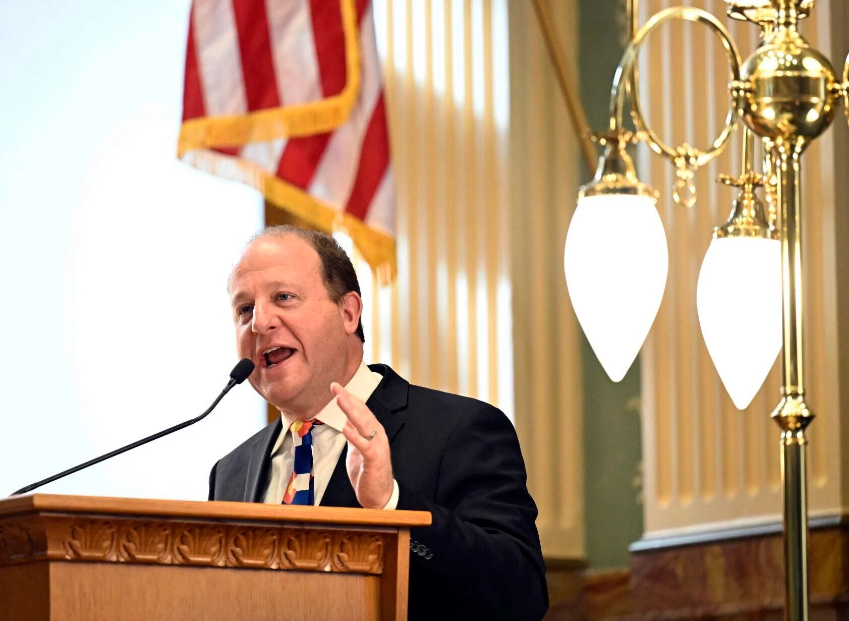 Colorado Gov. Jared Polis delivers the 2023 State of the State address to a joint session of the Legislature in the state Capitol in January. (The Associated Press)
