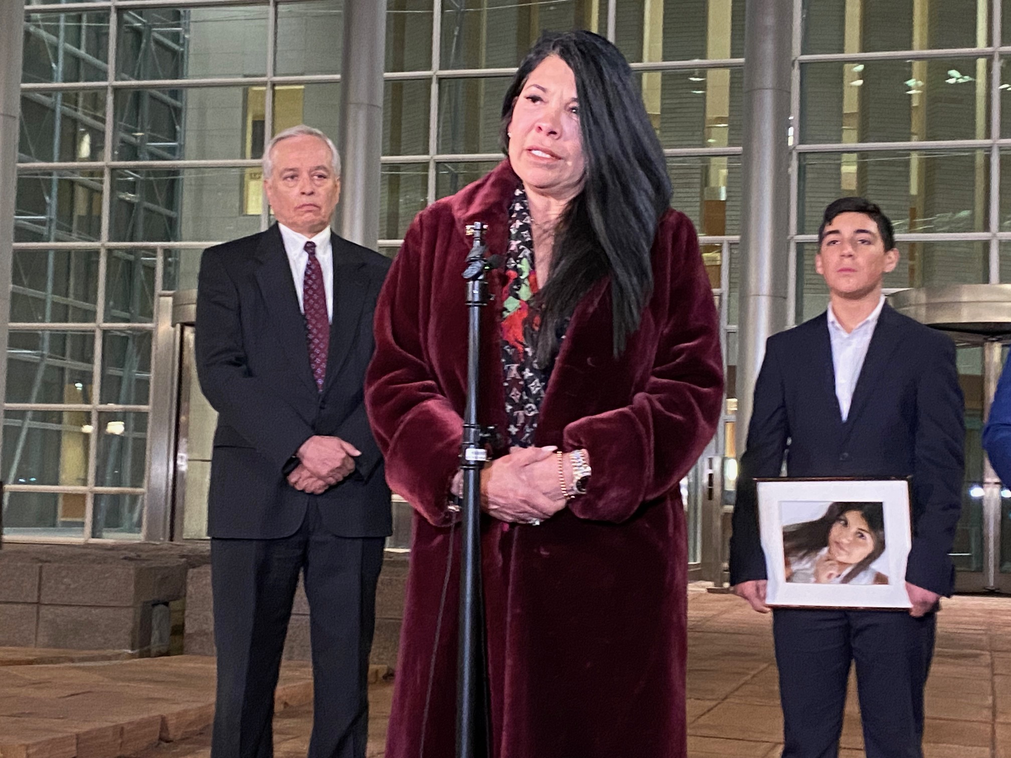 Andrea Thomas spoke at Bruce Holder's sentencing. She lost her daughter, Ashley Romero, in part to fentanyl poisoning along with other substances which were found in her body. Romero's 13 year old son Daniel held her framed photo in the courtroom. (Carol McKinley)
