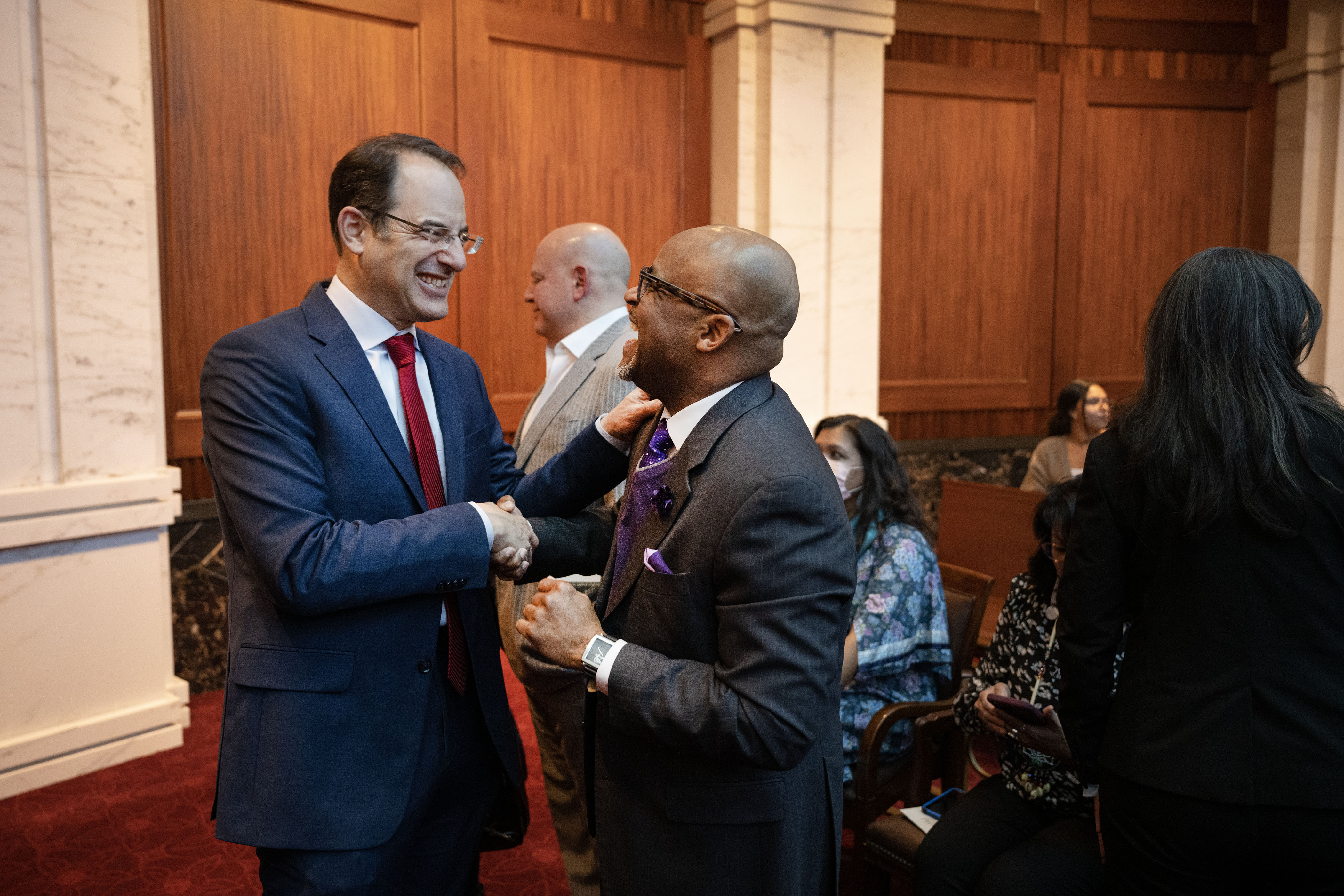 Attorney General Phil Weiser laughs with Denver Mayor Michael Hancock before the investiture ceremony for Weiser’s second term in the Colorado Supreme Court chambers on Thursday, Jan. 12, 2023, in Denver, Colo.(Timothy Hurst/The Gazette) (TimHursttim.hurst@gazette.comhttps://secure.gravatar.com/avatar/aca82bd62b4ee425c598527cd6faa1b1?d=mm&r=g)