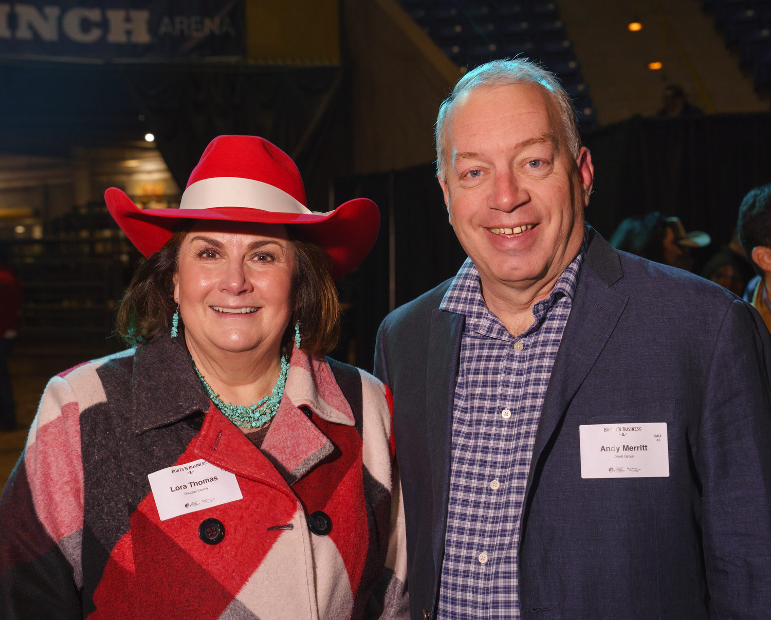 Lora Thomas, Douglas County Commissioner, and Andy Merritt, chief strategy officer with The O’Neil Group. Boots ’n Business event, hosted by the Denver Metro Chamber of Commerce, at the National Western Events Center in Denver, Colorado, on Friday, Jan. 6, 2023. Photo StevePeterson.photo (STEVE PETERSON/SPECIAL TO COLORADO POLITICS)