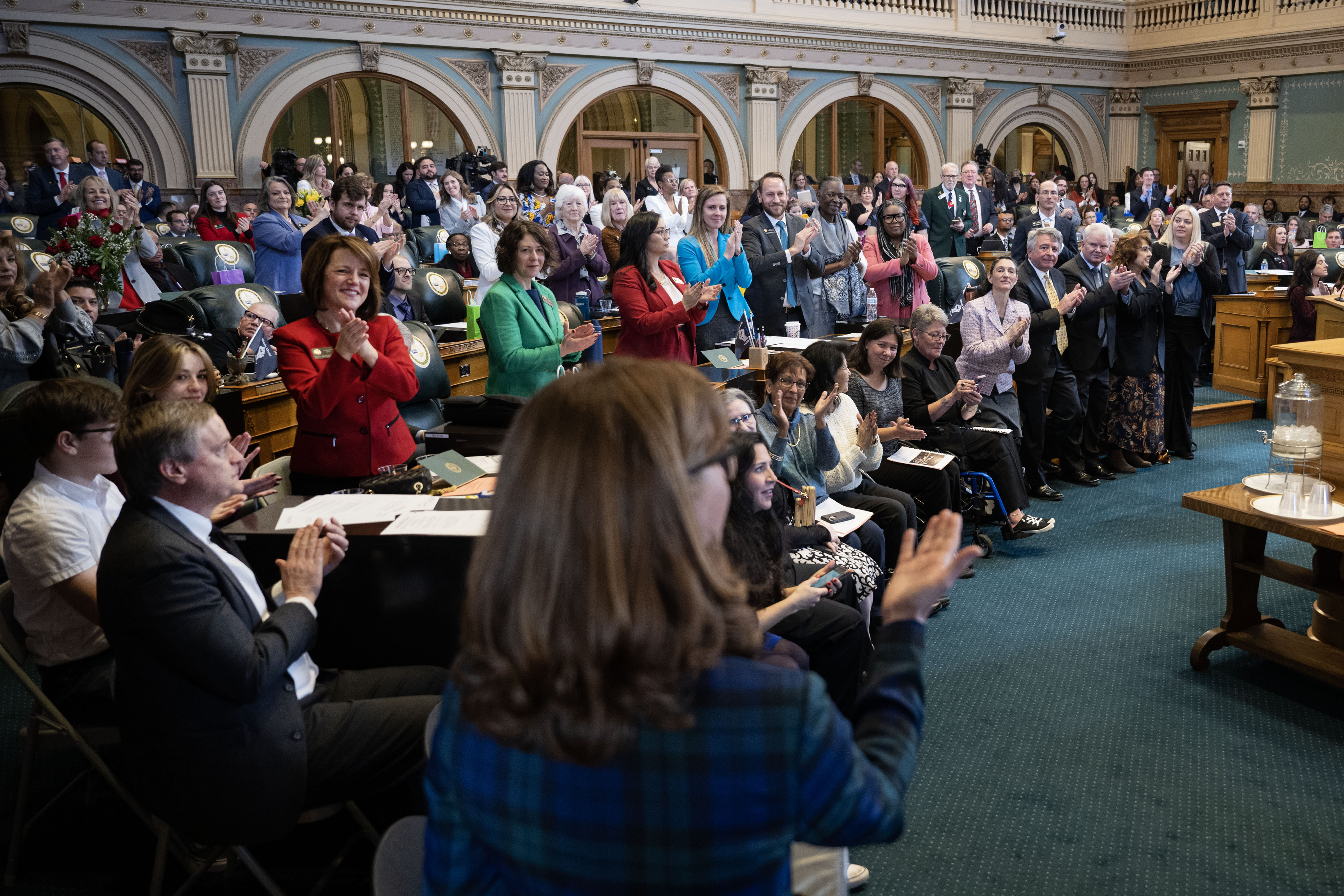Rep. Julie McCluskie receives a standing ovation from Democrats after being nominated for Speaker of he House during the first day of Colorado's 2023 session at the Colorado State Capitol building on Monday, Jan. 9, 2023, in Denver, Colo.(Timothy Hurst/The Denver Gazette) (TimHursttim.hurst@gazette.comhttps://secure.gravatar.com/avatar/aca82bd62b4ee425c598527cd6faa1b1?d=mm&r=g)