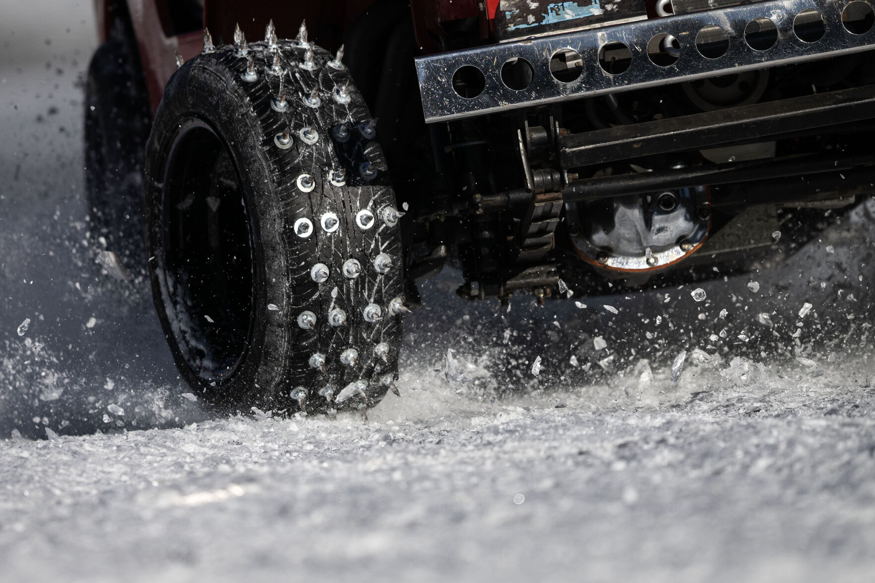 Ice explodes off the frozen lake under the “Cheater” tires on Joe Huffaker’s race Jeep during the first day of the Our Gang 4 Wheelers ice racing club’s 2023 racing season on Saturday, Jan. 7, 2023, in Georgetown, Colo. The Cheater division is named for the tires used, which have 1 1/2 inch sharpened bolts protruding from them. (Timothy Hurst/The Denver Gazette) (TimHursttim.hurst@gazette.comhttps://secure.gravatar.com/avatar/aca82bd62b4ee425c598527cd6faa1b1?d=mm&r=g)