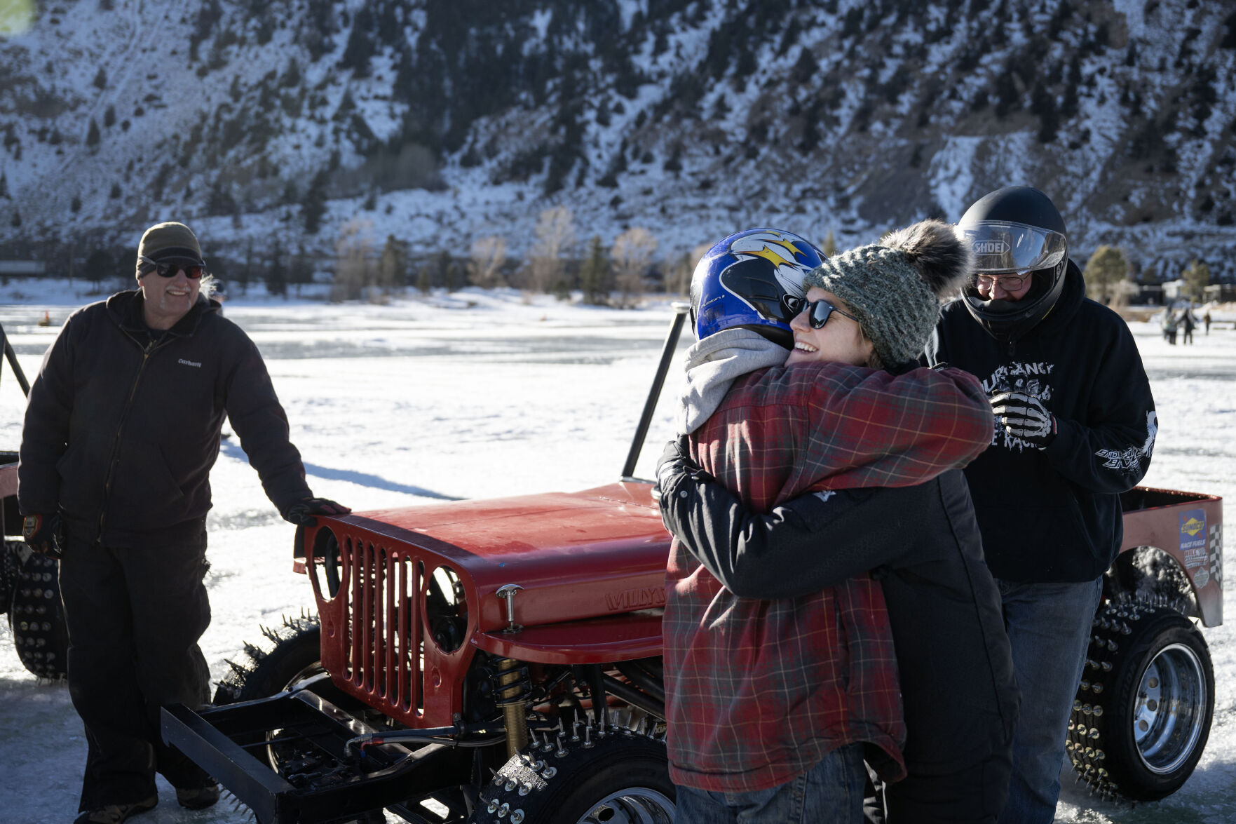 Men’s Competition Cheaters race winner Lee Bashline, left, hugs his daughter, and winner of the Women’s Competition Cheaters race, Lindsey Johansen, after winning the last race of the day during the first day of the Our Gang 4 Wheelers ice racing club’s 2023 racing season on Saturday, Jan. 7, 2023, in Georgetown, Colo. The Cheater division is named for the tires used, which have 1 1/2 inch sharpened bolts protruding from them. (Timothy Hurst/The Denver Gazette) (TimHursttim.hurst@gazette.comhttps://secure.gravatar.com/avatar/aca82bd62b4ee425c598527cd6faa1b1?d=mm&r=g)
