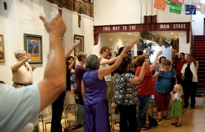 A toast celebrating Su Teatro's purchase of the Denver Civic Theatre in 2010. (JOHN MOORE/THE DENVER GAZETTE)