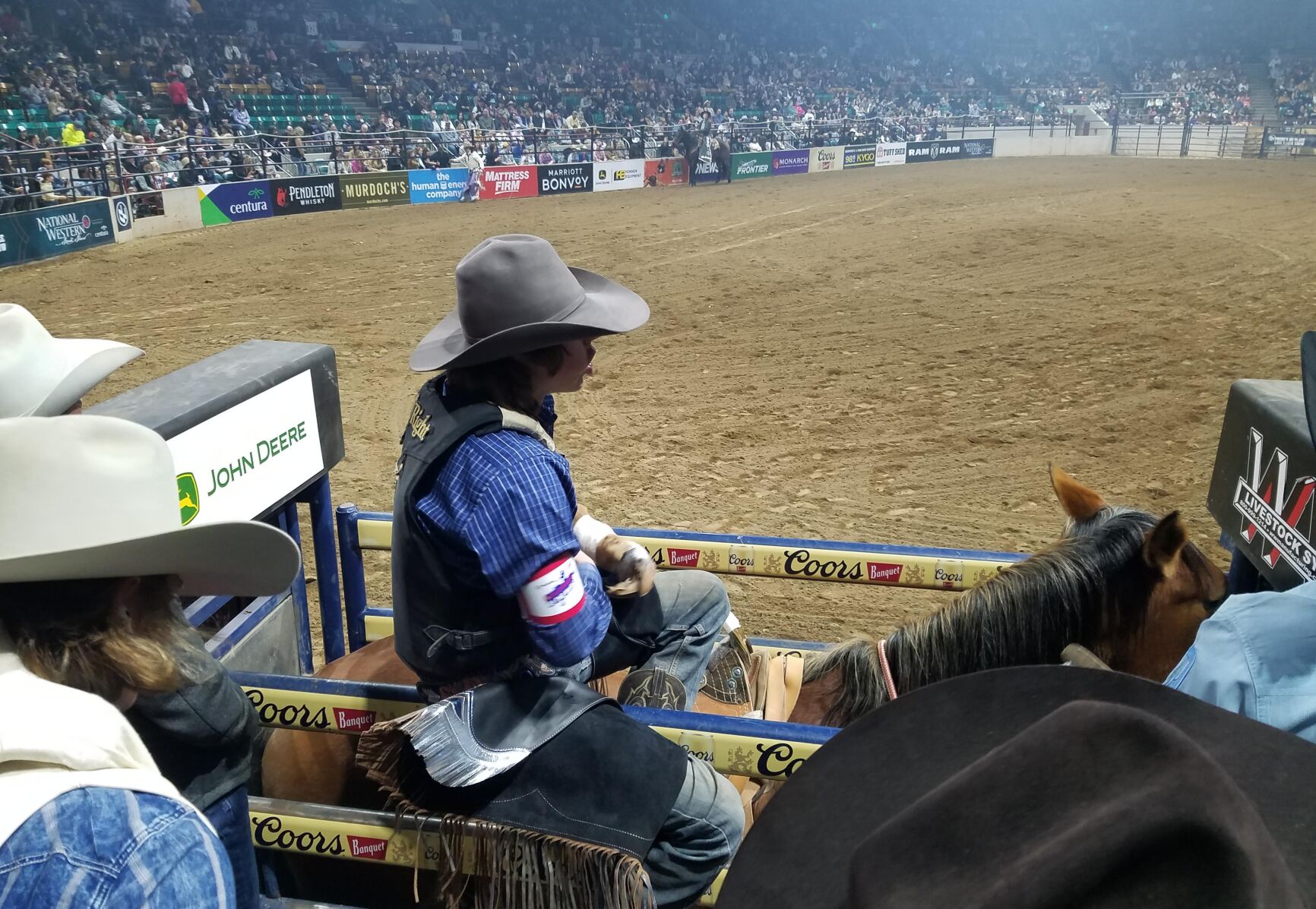 Cowboys ready for bronc riding at Saturday’s semifinals for the Colorado vs. The World Rodeo. (Mark Samuelson, Special to the Denver Gazette)