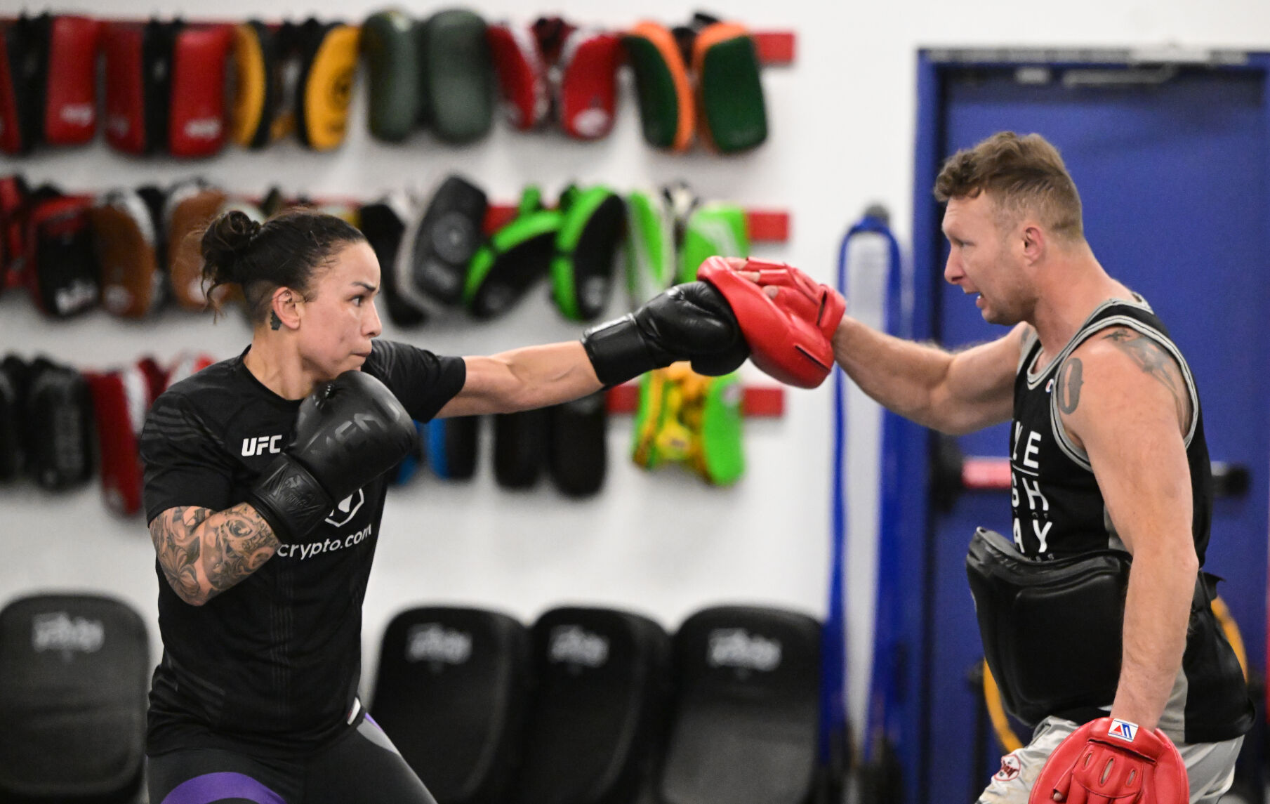 UFC fighter Raquel Pennington warms up with strike coach Justin Houghton on Monday, Jan. 9, 2023. Pennington went to Harrison High School and still lives in Colorado Springs. She is ranked #5 in the world and will fight Ketlen Vieira, who is ranked #2, on Saturday night in Las Vegas. (Photo by Jerilee Bennett, The Gazette)