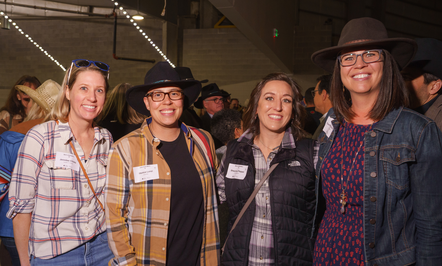 Jennilee Childs, Noodles & Company HR Director; Monica Lanzi, with Ardent Mills; Shaunna Peppel, with VF Corporation; and Courtney Hutchison, MJ Insurance Market President for Colorado. Boots ’n Business event, hosted by the Denver Metro Chamber of Commerce, at the National Western Events Center in Denver, Colorado, on Friday, Jan. 6, 2023. Photo StevePeterson.photo (STEVE PETERSON/SPECIAL TO COLORADO POLITICS)