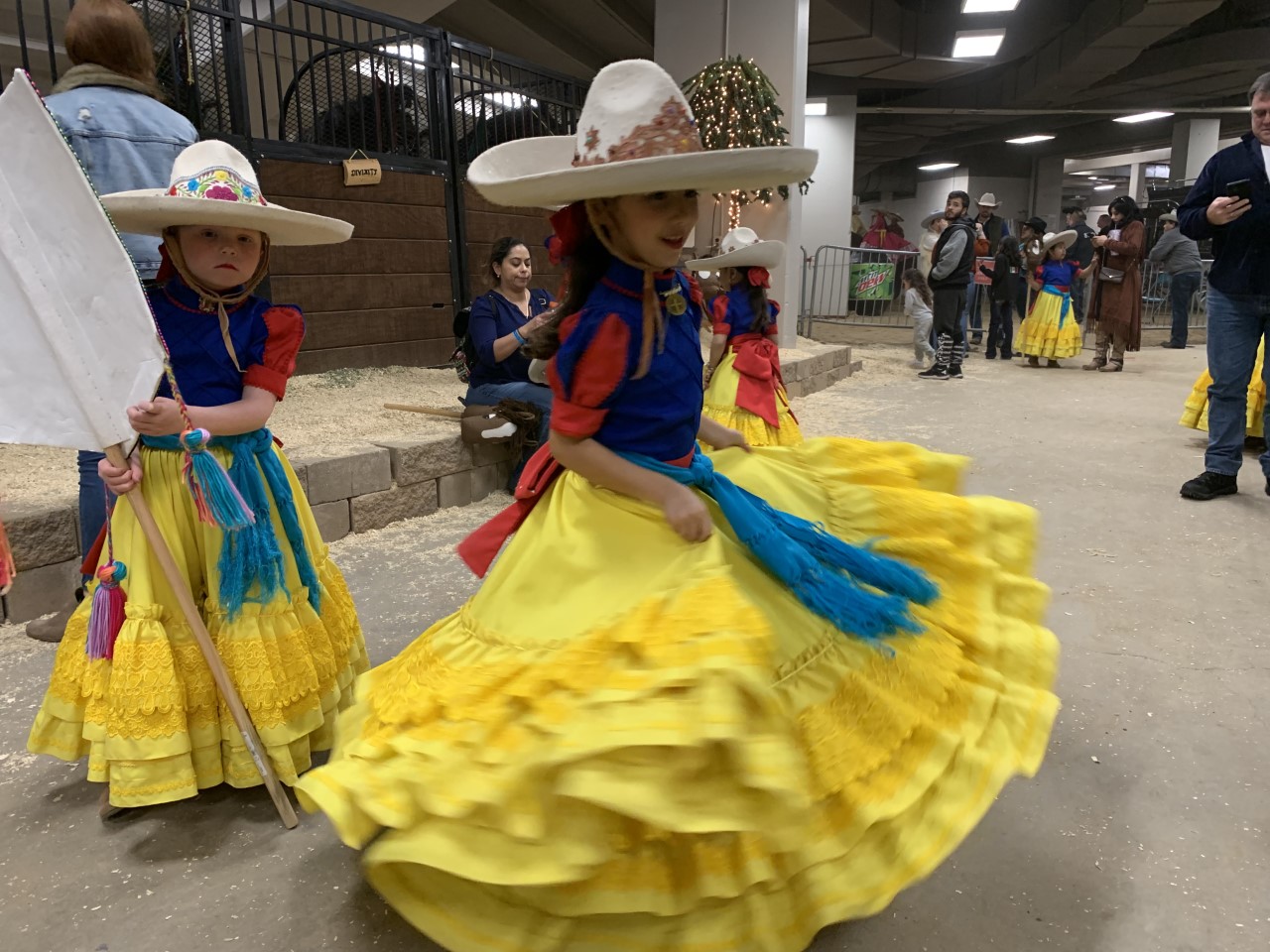 Julieta, 6, (left) practices backstage before the Mini Escaramuza 