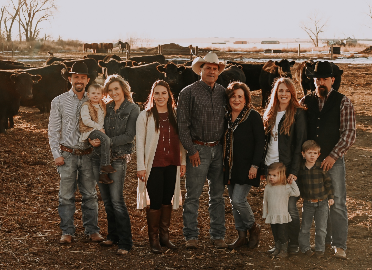The Walter family, which runs Walter Angus in Hudson. Walter Angus was awarded the Colorado Cattlemen's Association Outstanding Seedstock Producer of the Year award for 2022. Far left, Ty, middle Owner Terry Walter and Trevor, far right, with their wives and children. (COURTESY OF WALTER ANGUS)