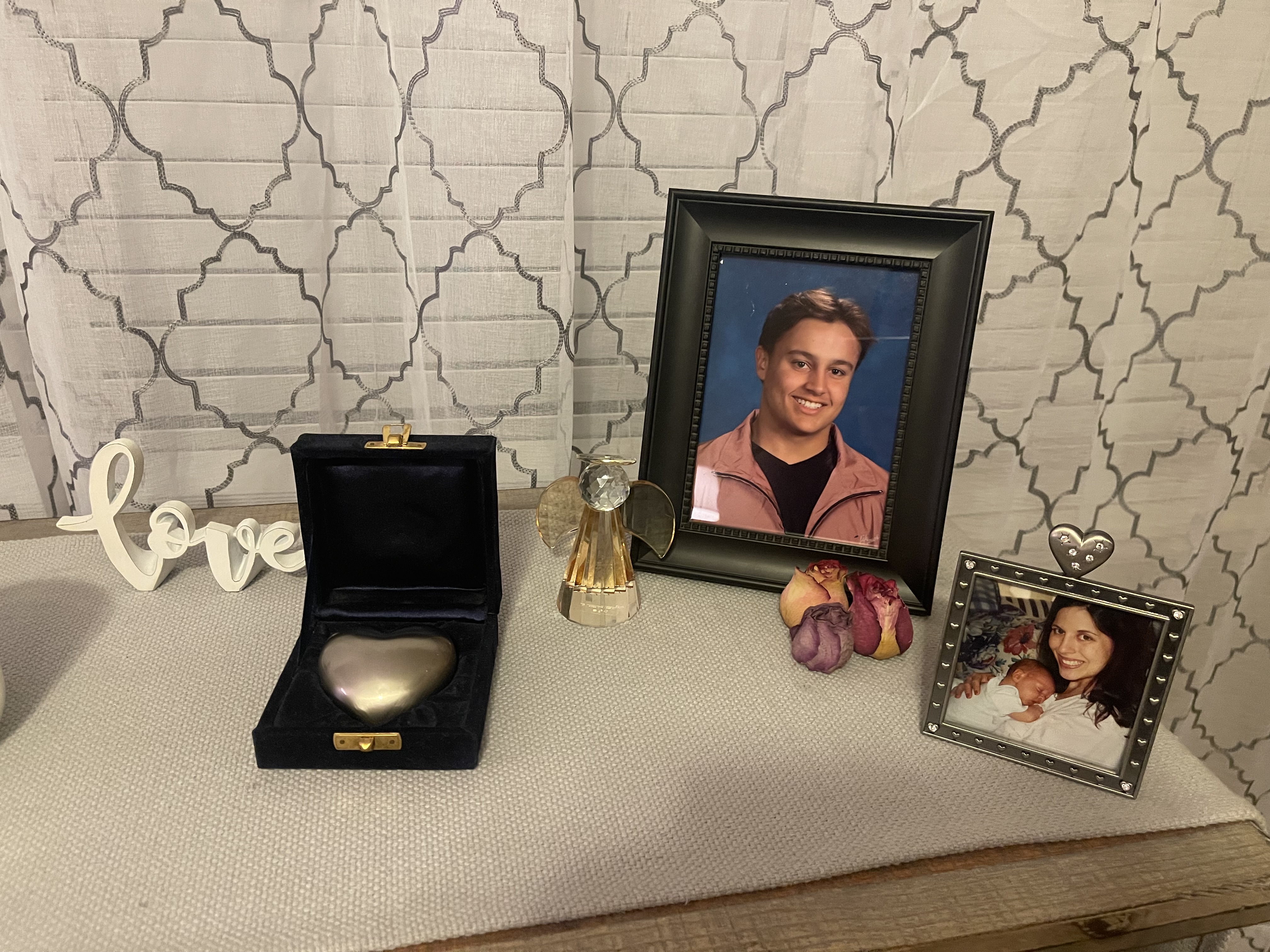 Kim Osterman's desk at home in Broomfield honors her son Max, who died at the age of 18 from fentanyl-involved poisoning. A silver heart holds Max's ashes. (COURTESY OF KIM OSTERMAN)