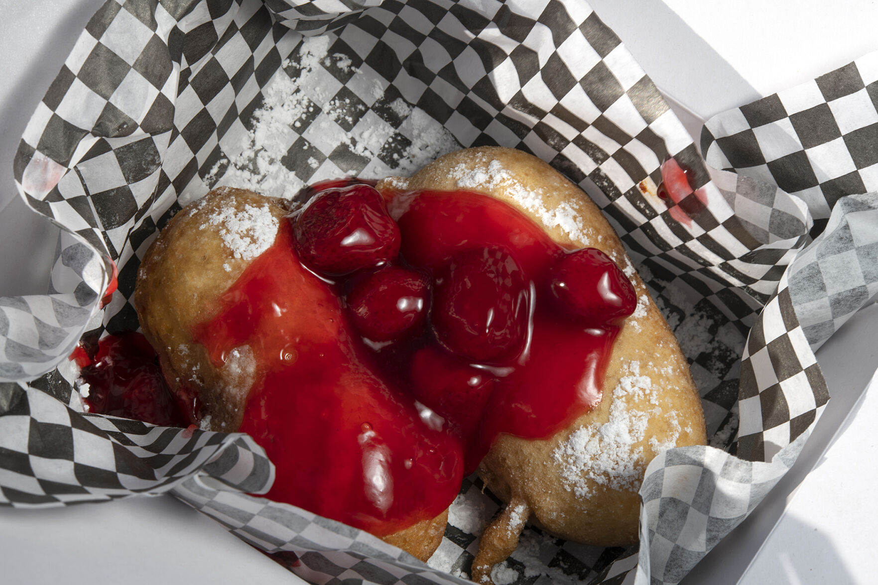 Fried Twinkie at Po’Brothers. The cream-fllled snack comes with salted caramel or strawberry sauce. (Photos by Jeff Kearney, special to The Gazette)