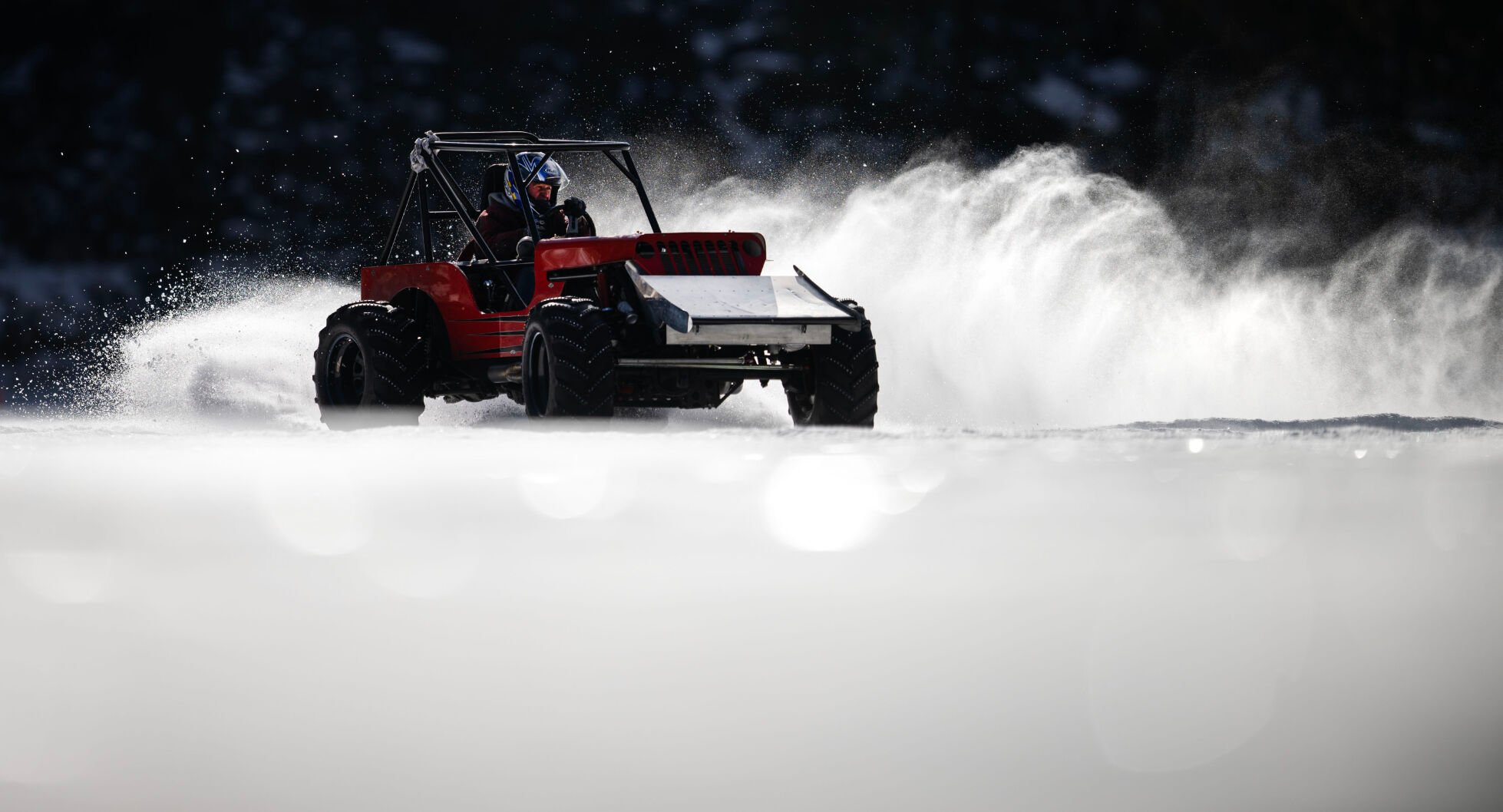 Lee Bashline’s highly modified single-seater Willys kicks up a load of lake ice during the first day of the Our Gang 4 Wheelers ice racing club’s 2023 racing season on Saturday, Jan. 7, 2023, in Georgetown, Colo. (Timothy Hurst, The Gazette)