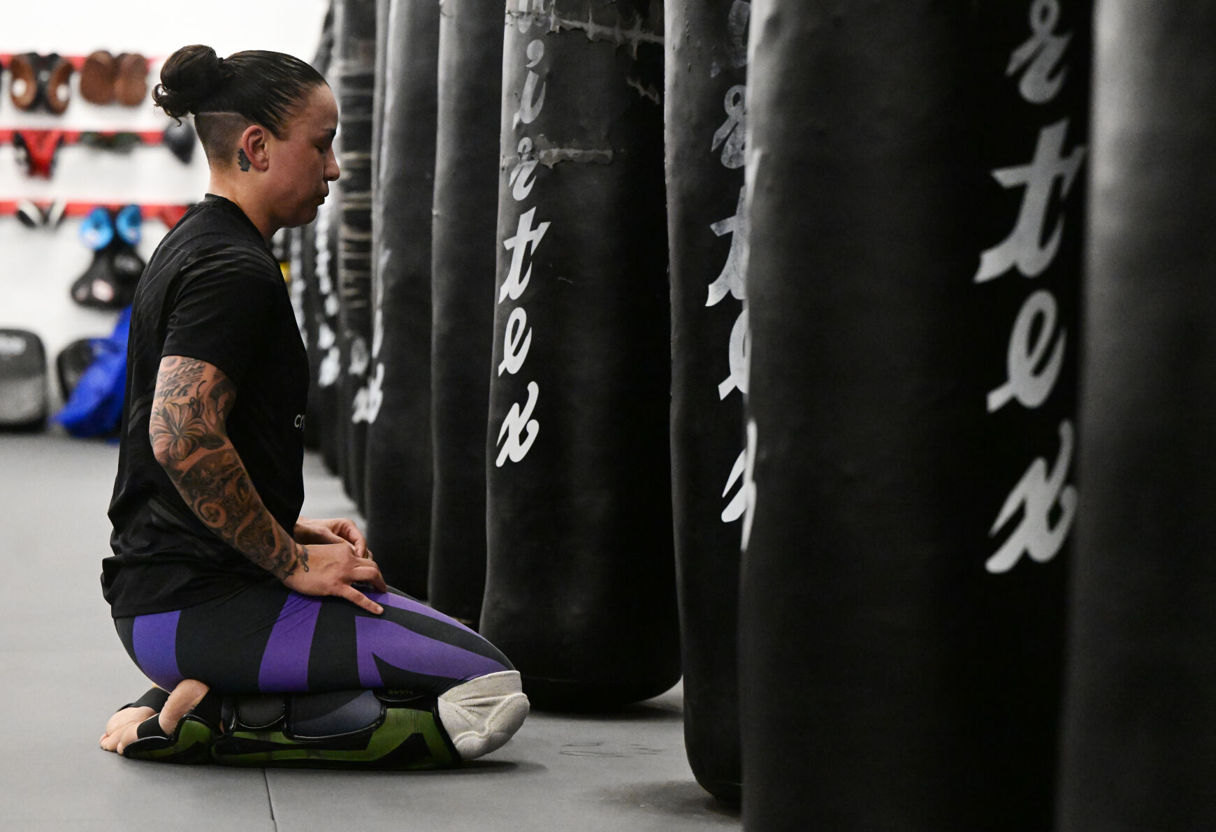UFC fighter Raquel Pennington meditates before practice on Monday, Jan. 9, 2023. Pennington went to Harrison High School and still lives in Colorado Springs. She is ranked #5 in the world and will fight Ketlen Vieira, who is ranked #2, on Saturday night in Las Vegas. (Photo by Jerilee Bennett, The Gazette)