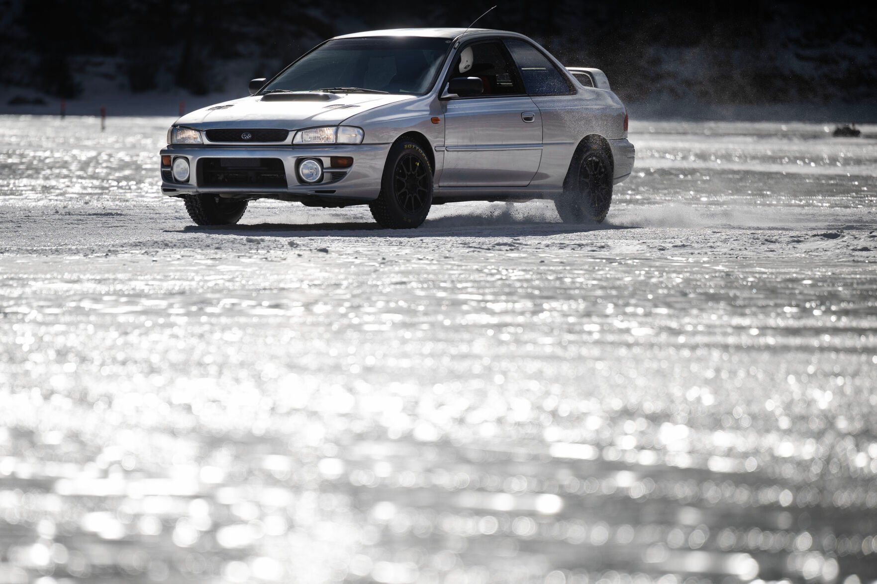 Driver Val, no last name given, his 1995 Subaru Impreza 2.5RS in the during the first day of the Our Gang 4 Wheelers ice racing club’s 2023 racing season on Saturday, Jan. 7, 2023, in Georgetown, Colo.(Timothy Hurst/The Denver Gazette) (TIMOTHY HURST/DENVER GAZETTE)