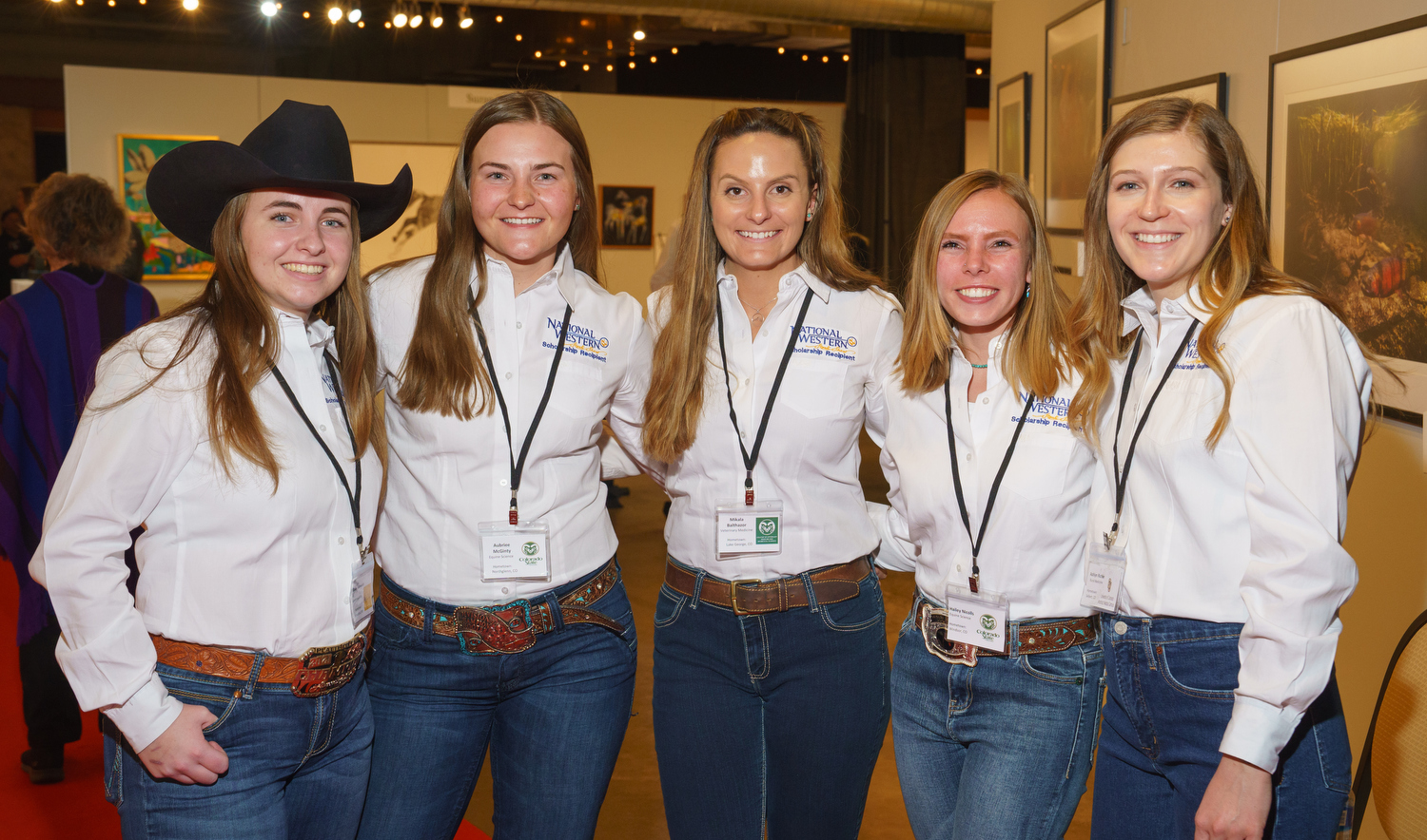 National Western Scholarship recipients: Bailey Fitzwater (University of Wyoming), Aubrie McGinty (Colorado State University), Mikala Balthazor (CSU), Hailey Nicolls (CSU), and Ashlyn Richie (University of Colorado, Anschutz Medical Campus). The 30th Coors Western Art Exhibit & Sale Red Carpet Reception at the National Western Stock Show Expo Hall, Coors Western Art Gallery, in Denver, Colorado, on Tuesday, Jan. 3, 2023. Photo StevePeterson.photo (STEVE PETERSON/SPECIAL TO COLORADO POLITICS)