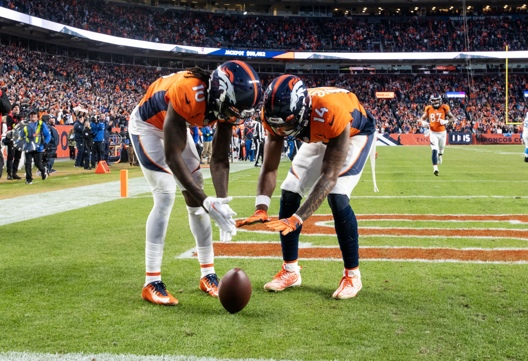 Denver Broncos wide receivers Jerry Jeudy (10) and Courtland Sutton (14) celebrate after Sutton scored a touchdown during the second half of the last regular season game Sunday, Jan. 8, 2023 at Empower Field at Mile High in Denver. (Parker Seibold, The Gazette) (Parker Seibold)