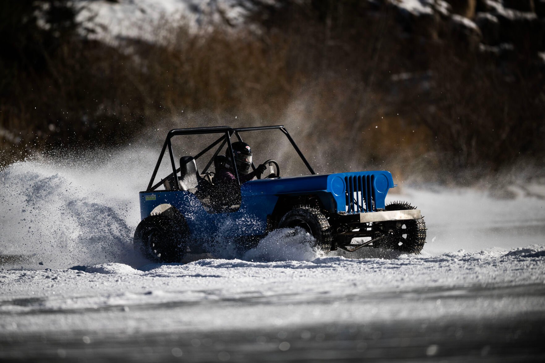 Lindsey Johansen drives in the Women’s Competition Cheaters class during the first day of the Our Gang 4 Wheelers ice racing club’s 2023 racing season on Saturday, Jan. 7, 2023, in Georgetown, Colo. The Cheater division is named for the tires used, which have 1 1/2 inch sharpened bolts protruding from them.(Timothy Hurst/The Denver Gazette) (TIMOTHY HURST/DENVER GAZETTE)