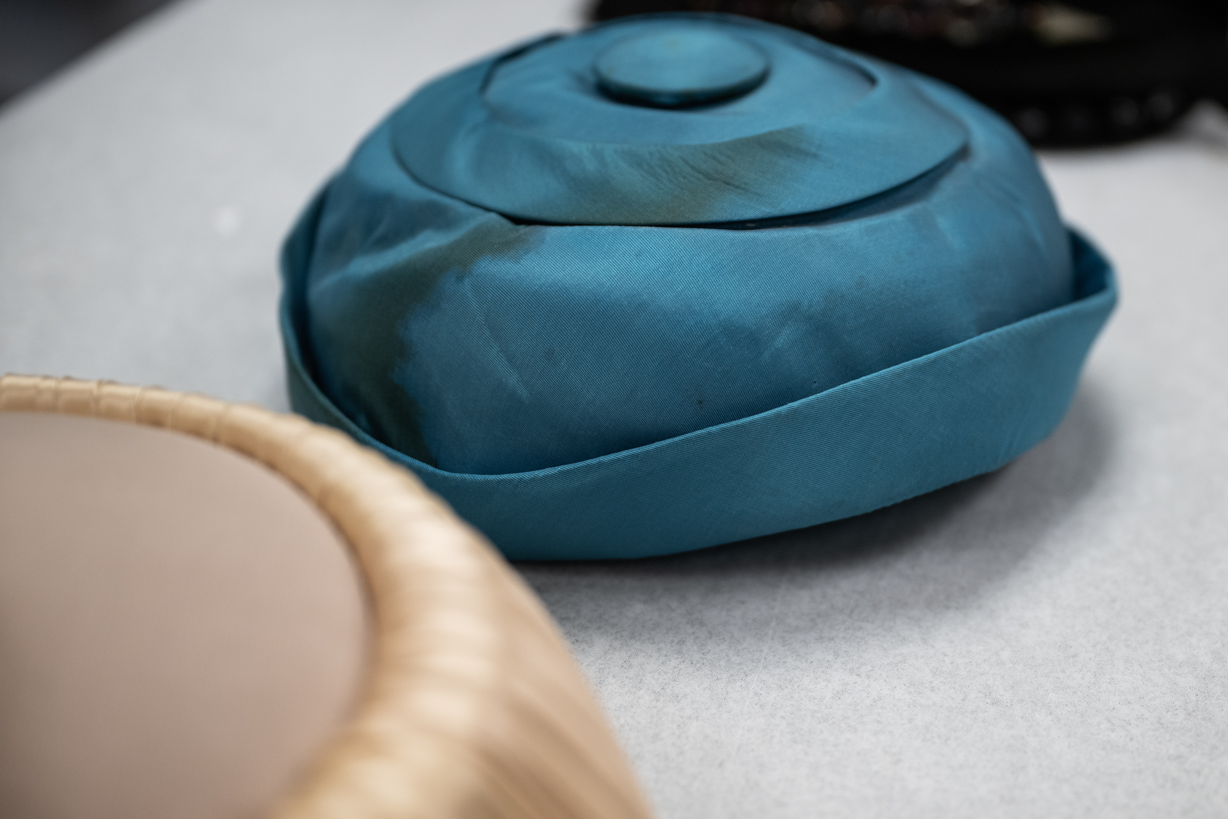 Water damage can be seen on a hat that is part of the museum’s costume collection on Thursday, Jan. 19, 2023, at the Aurora History Museum in Aurora, Colo.(Timothy Hurst/The Denver Gazette) (TIMOTHY HURST/DENVER GAZETTE)