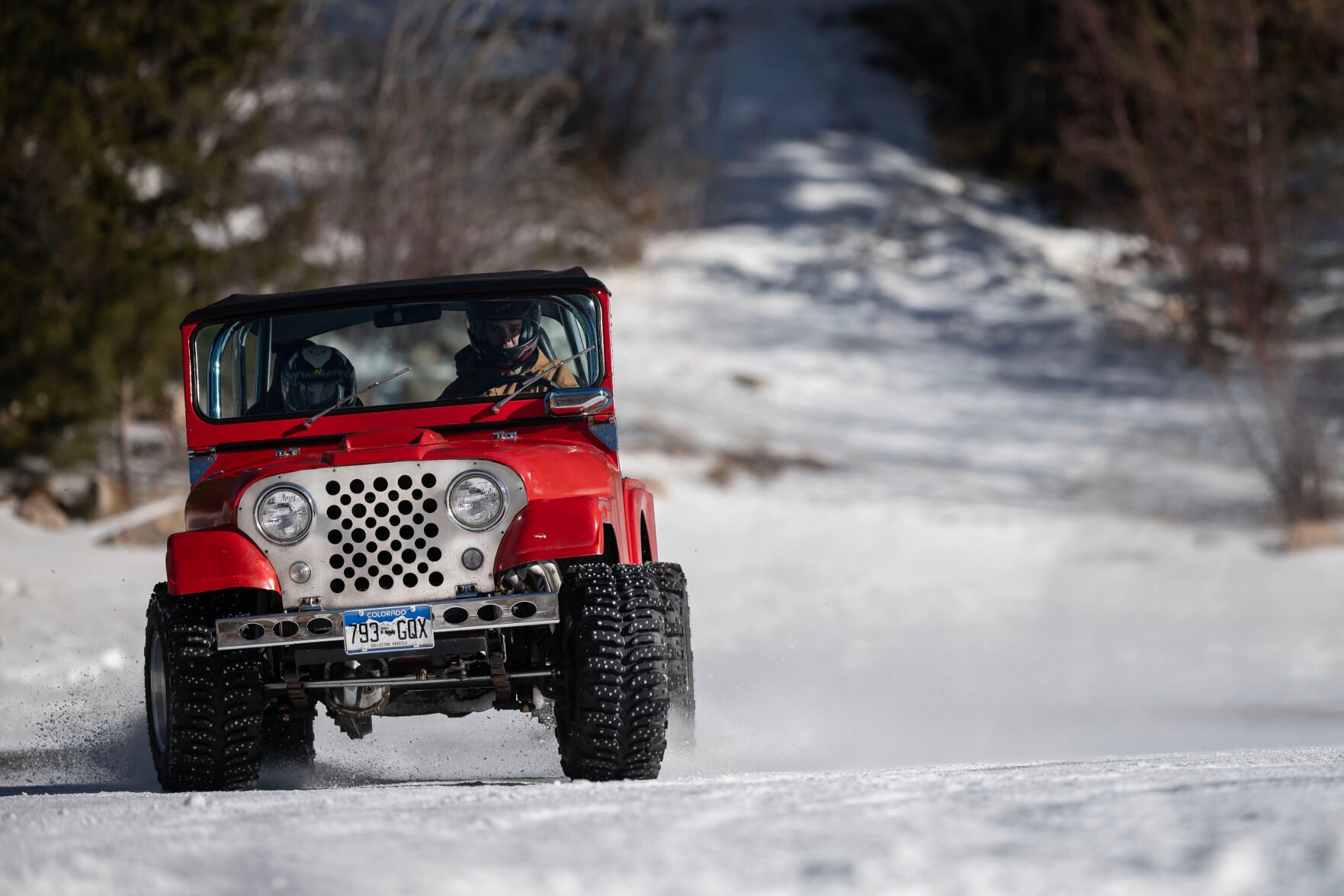 Cody Ling drifts around a corner with Cooper Altman riding beside him during a race in the Men’s Pro Street Studs races during the first day of the Our Gang 4 Wheelers ice racing club’s 2023 racing season on Saturday, Jan. 7, 2023, in Georgetown, Colo.(Timothy Hurst/The Denver Gazette) (TIMOTHY HURST/DENVER GAZETTE)