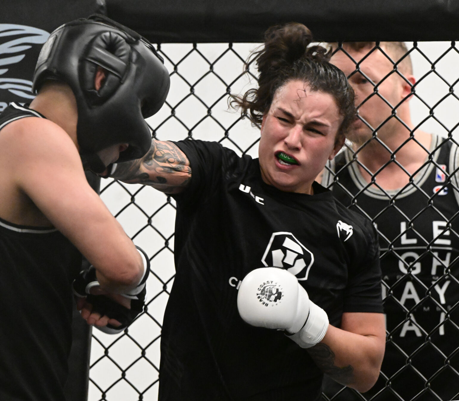 UFC fighter Raquel Pennington practices with a male sparring partner on Monday, Jan. 9, 2023. Pennington went to Harrison High School and still lives in Colorado Springs. She is ranked #5 in the world and will fight Ketlen Vieira, who is ranked #2, on Saturday night in Las Vegas. (Photo by Jerilee Bennett, The Gazette)