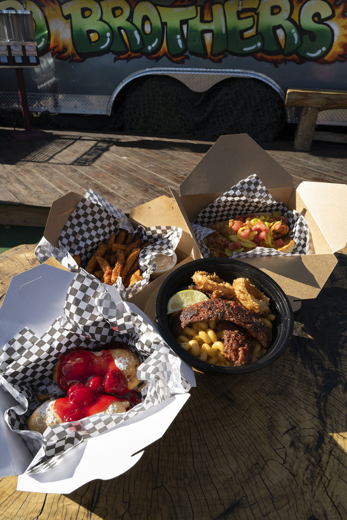 Po’ Brothers Cajun (Located at: 1826 E. Platte Ave.) “Fried Twinkie, Mac and Cheese with Andouille Sausage, Cajun Fries and Shrimp Po’Boy To-Go” Thursday January 12, 2023. Photo by Jeff Kearney. (Jeff Kearney)