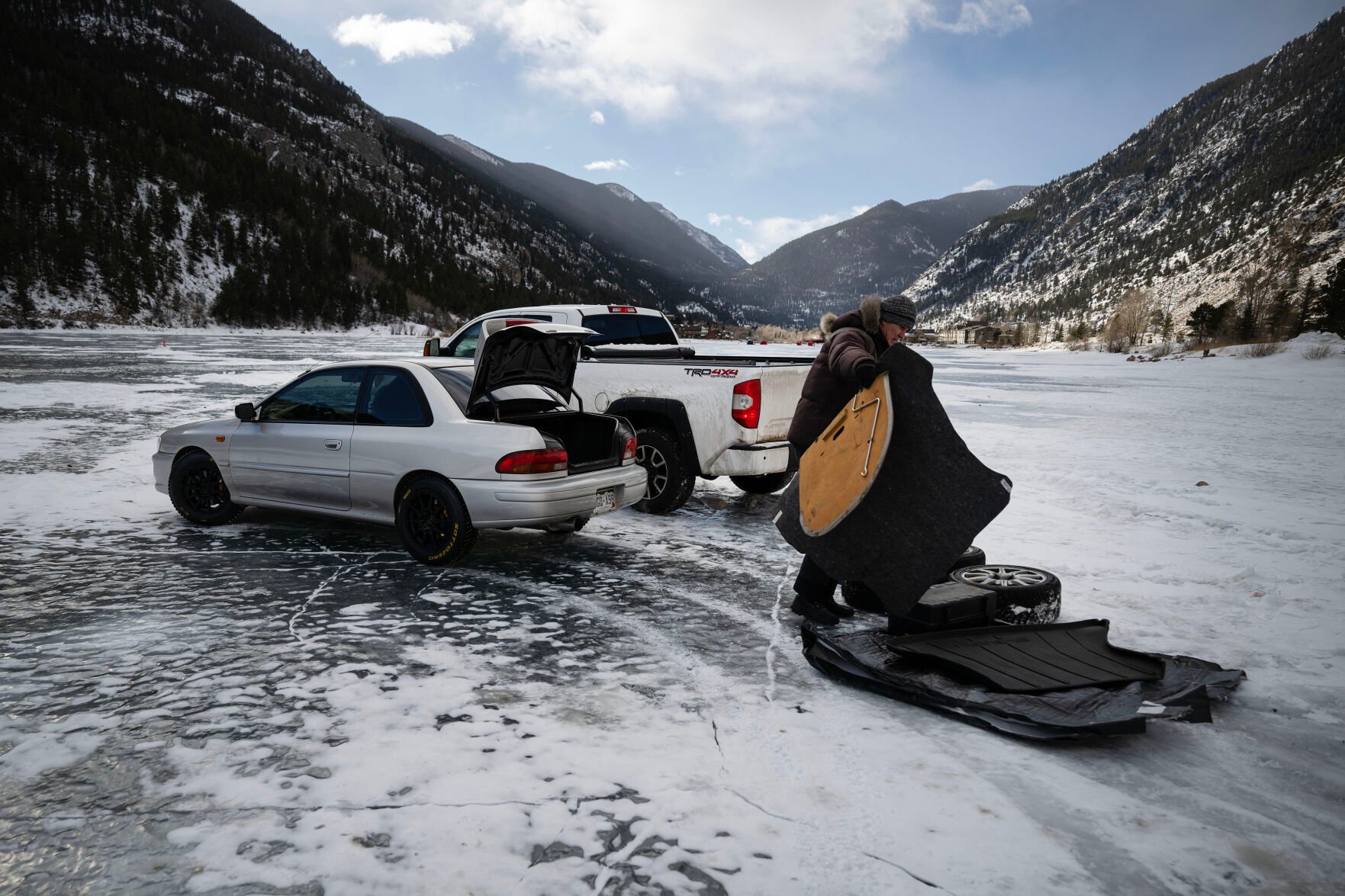 Driver Val, no last name given, pulls all the extra weight he can out of his 1995 Subaru Impreza 2.5RS during the first day of the Our Gang 4 Wheelers ice racing club’s 2023 racing season on Saturday, Jan. 7, 2023, in Georgetown. (Timothy Hurst, The Gazette)