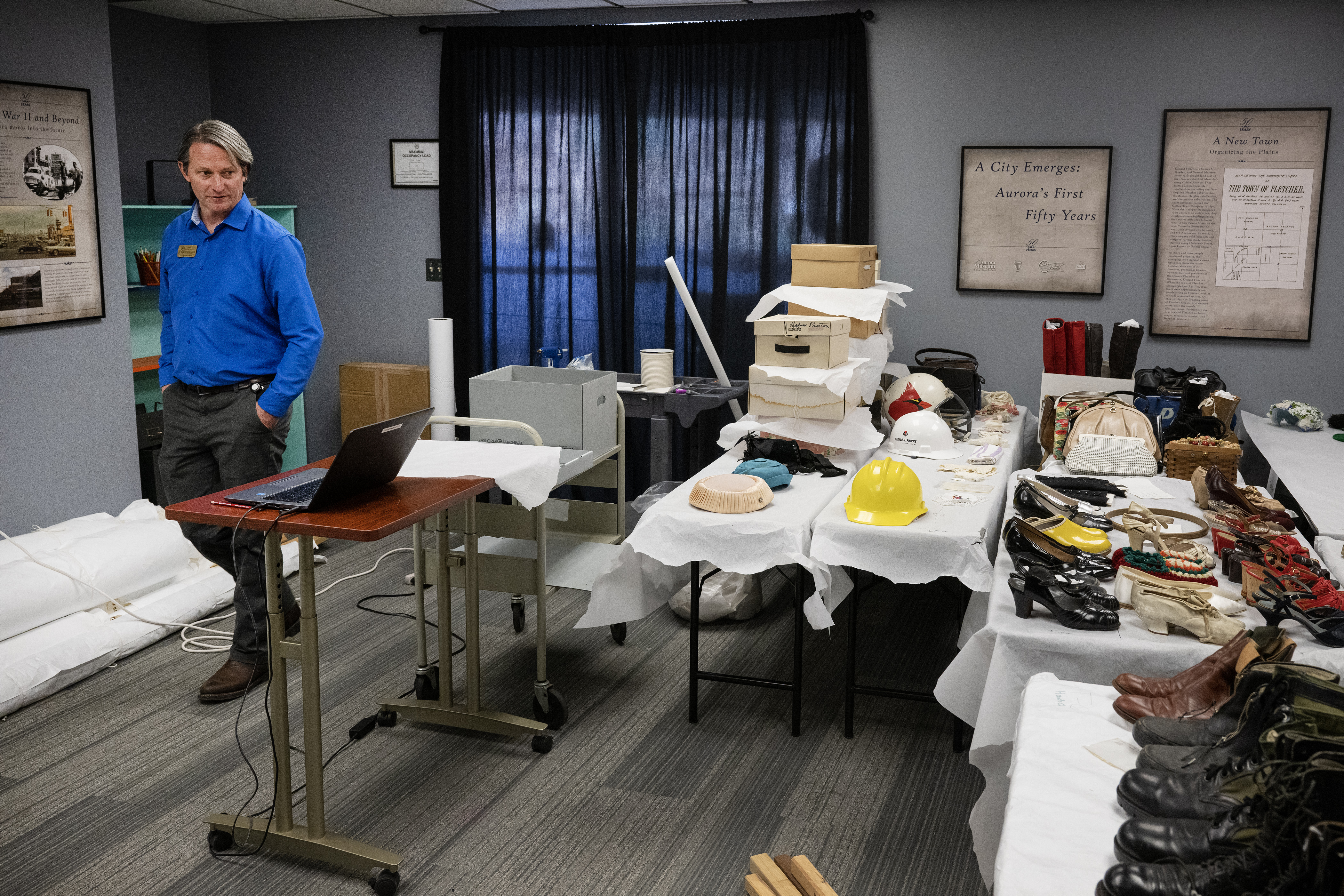 Museum director T. Scott Williams glances at the still-to-be-inspected and cataloged items that were among the artifacts exposed to water from a leaking upstairs water fountain on Thursday, Jan. 19, 2023, at the Aurora History Museum in Aurora, Colo.(Timothy Hurst/The Denver Gazette) (TimHursttim.hurst@gazette.comhttps://secure.gravatar.com/avatar/aca82bd62b4ee425c598527cd6faa1b1?d=mm&r=g)