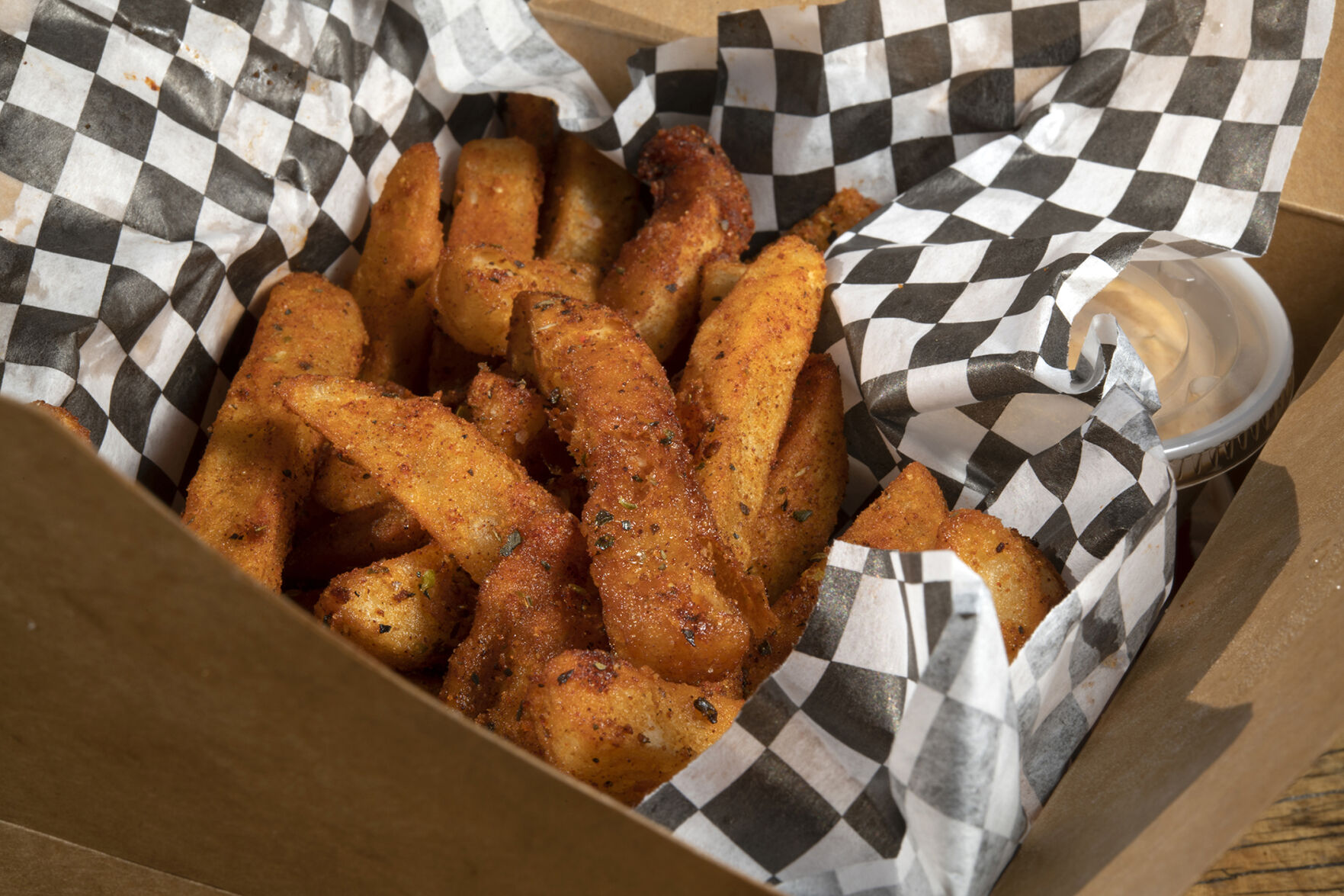 Po’ Brothers Cajun (Located at: 1826 E. Platte Ave.) “Cajun Fries To-Go” Thursday January 12, 2023. Photo by Jeff Kearney. (Jeff Kearney)