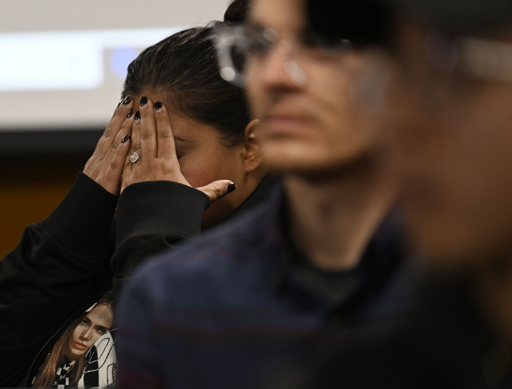 Darcy Cornish Lovato, a mother with two student in Denver Public Schools, attends the Denver Board of Education meeting. Lovato was happy with the final vote but was frustrated by the back-and-forth of the meeting after Superintendent Alex Marrero made a recommendation to close only two schools. (the Denver Gazette)