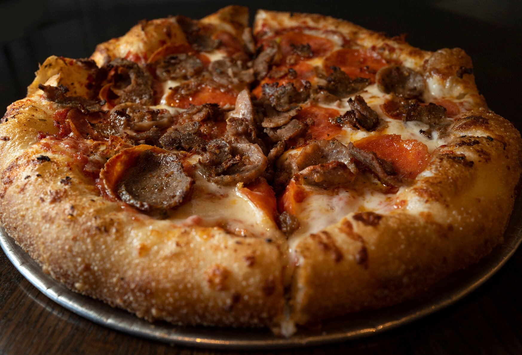 Mici Italian Restaurant (Located at: 3707 Bloomington St.) “Molto Carne Pizza” Monday December 119, 2022. Photo by Jeff Kearney. (Jeff Kearney)