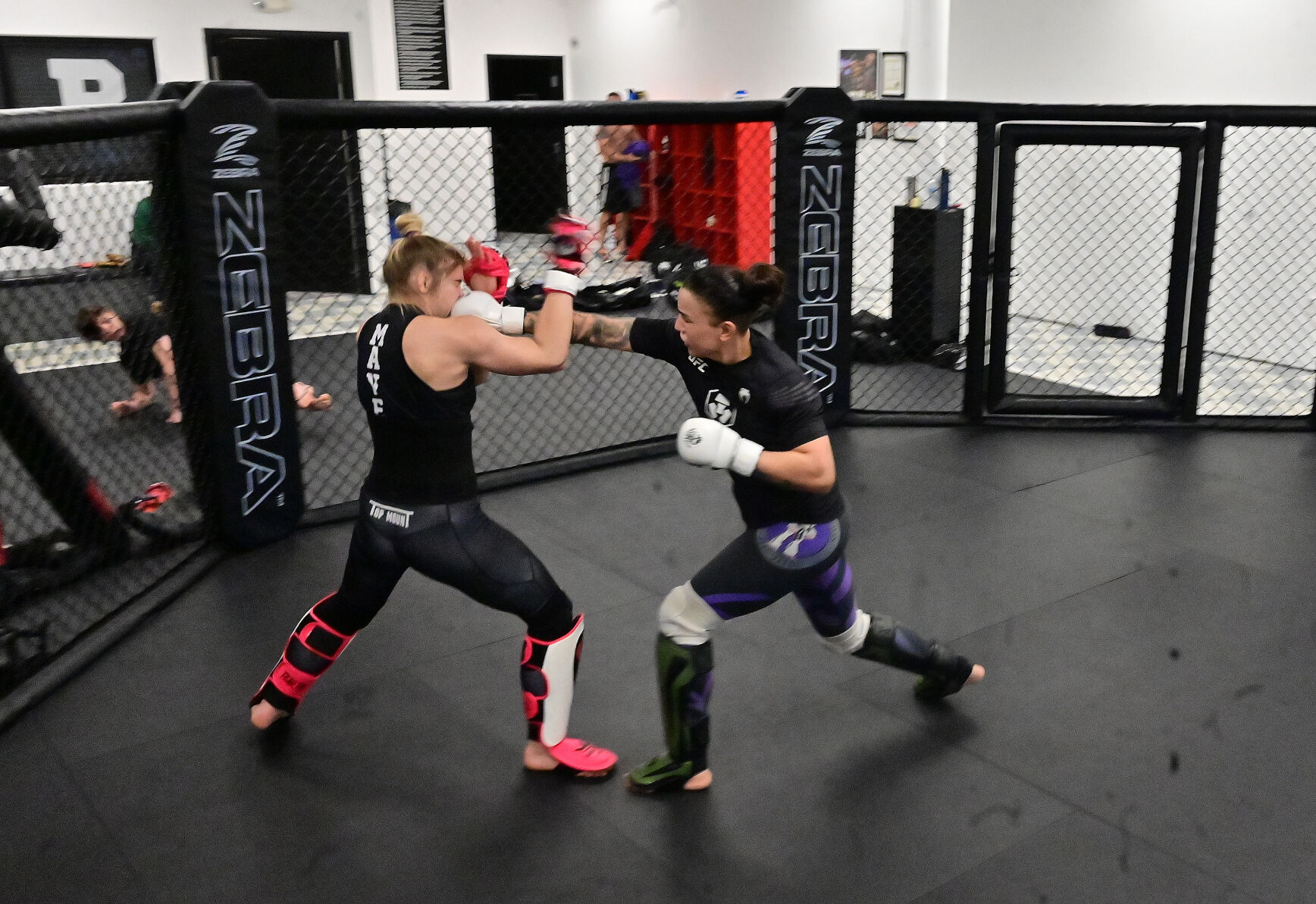 UFC fighter Raquel Pennington practices with sparring partner Miranda Maverick on Monday, Jan. 9, 2023. Pennington went to Harrison High School and still lives in Colorado Springs. She is ranked #5 in the world and will fight Ketlen Vieira, who is ranked #2, on Saturday night in Las Vegas. (Photo by Jerilee Bennett, The Gazette)