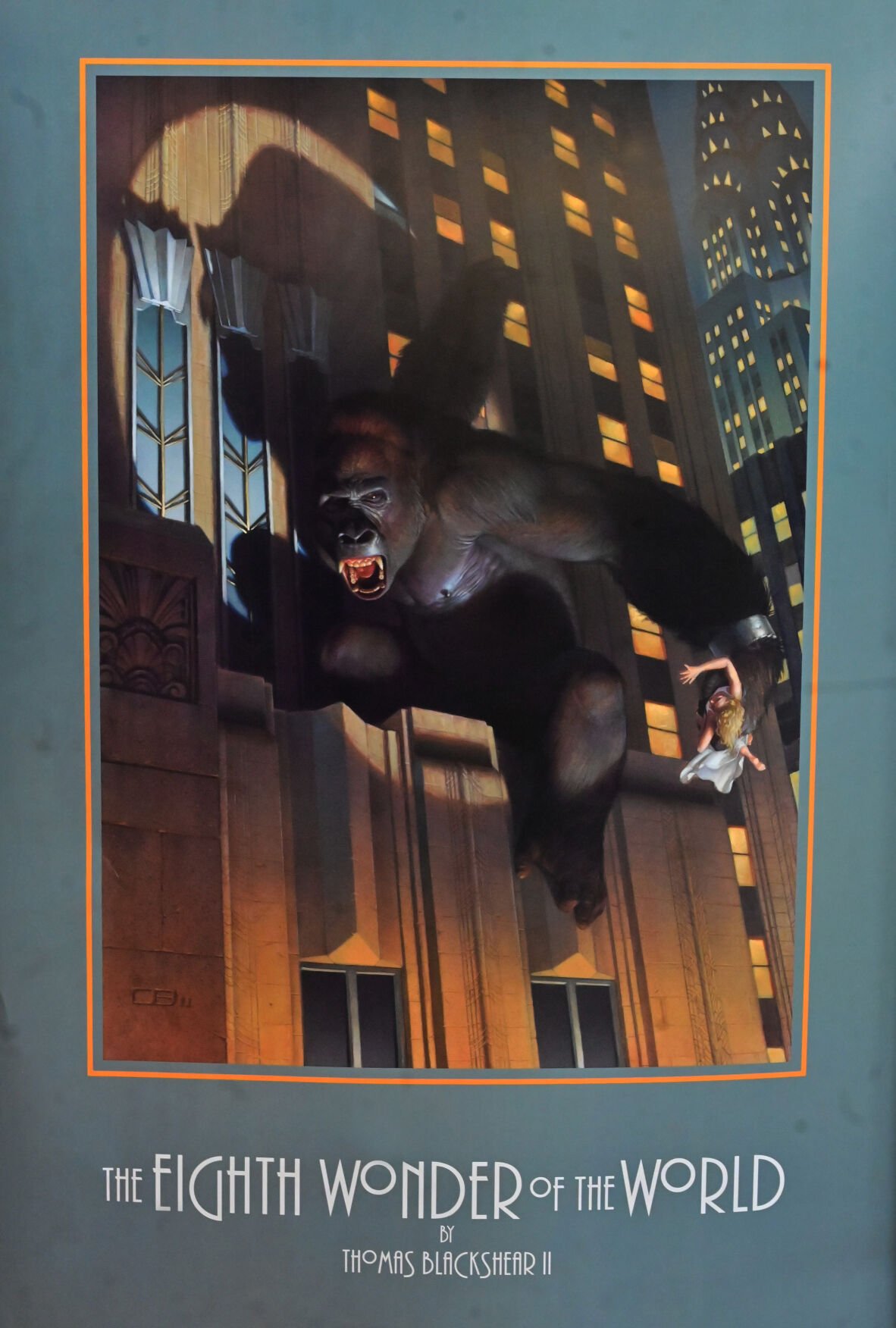 Thomas Blackshear III has a poster using his artwork that was sold on the website for a King Kong movie. The poster hangs on the wall in his studio. (Photo by Jerilee Bennett, The Gazette)