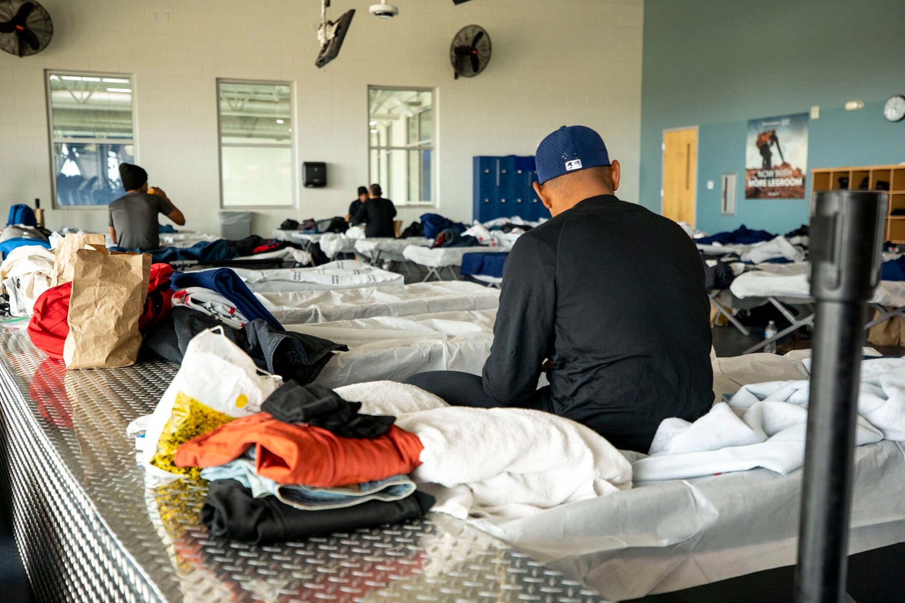 FILE PHOTO: Cots set up in an emergency shelter for people arriving from the southern U.S. border, set up at a Denver recreation center Dec. 13, 2022. (Kevin J. Beaty/Denverite,Pool) (KEVIN J. BEATY/DENVERITE/POOL)