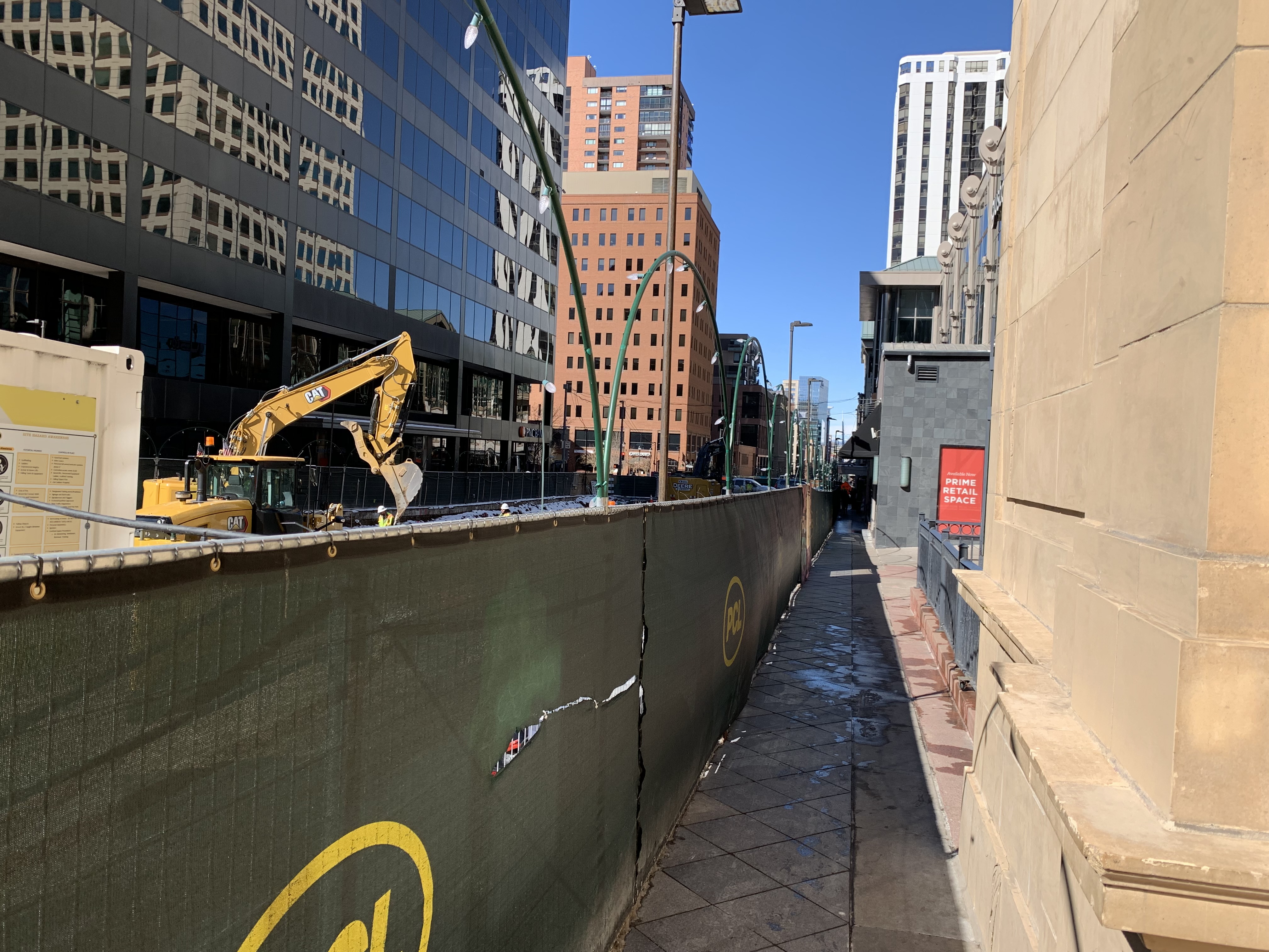 The $149 million renovation project on Denver's 16th Street Mall has caused narrow walkways next to heavy construction equipment. It's scheduled to finish in 2024. (Dennis Huspeni/Denver Gazette)