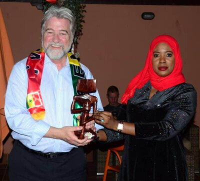 Arvada Center President and CEO Philip Sneed receives a gift during his recent cultural exchange visit to Senehal. (Provided by Philip Sneed)