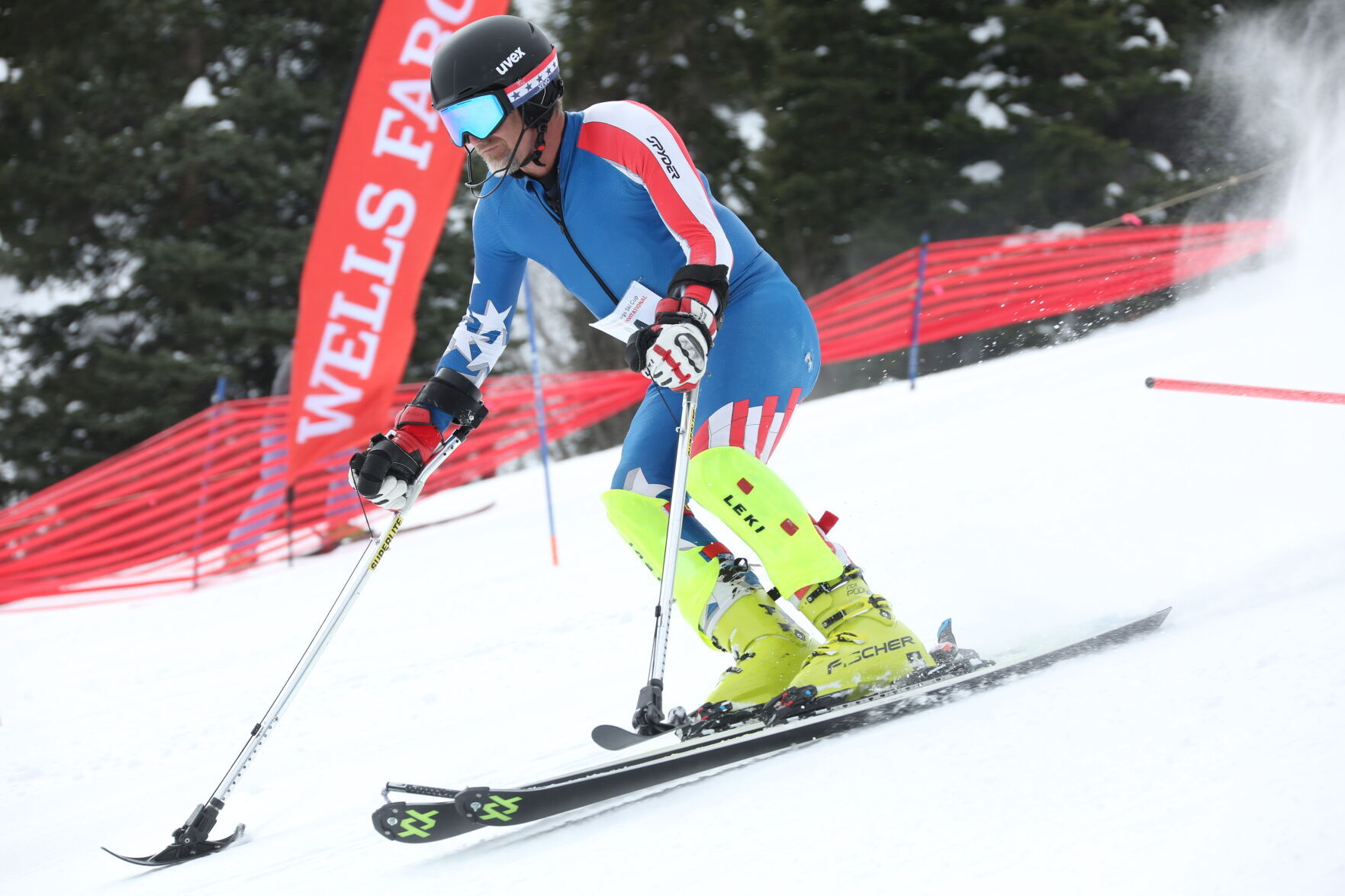 A skier uses his poles to make his way down a slope at a previous Wells Fargo Ski Cup. (Photos courtesy of the National Sports Center for the Disabled)