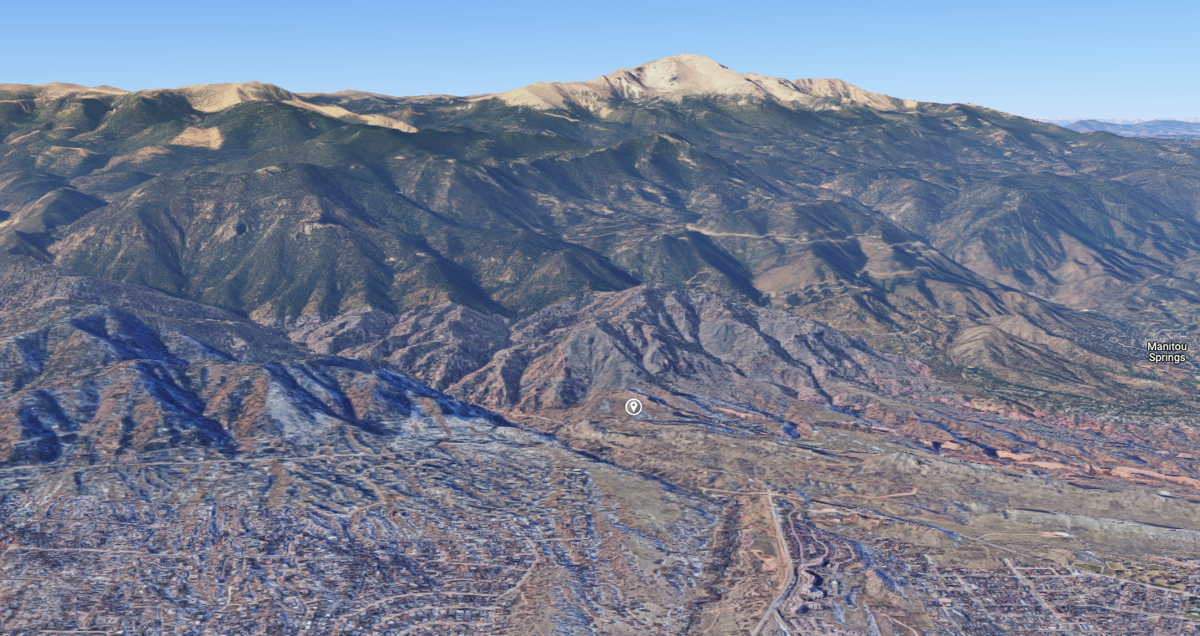 Looking west at Pikes Peak, the gray pin drop shows the rough location of Bear Creek Cañon Park. Map Credit: ©2023 Google Maps.
