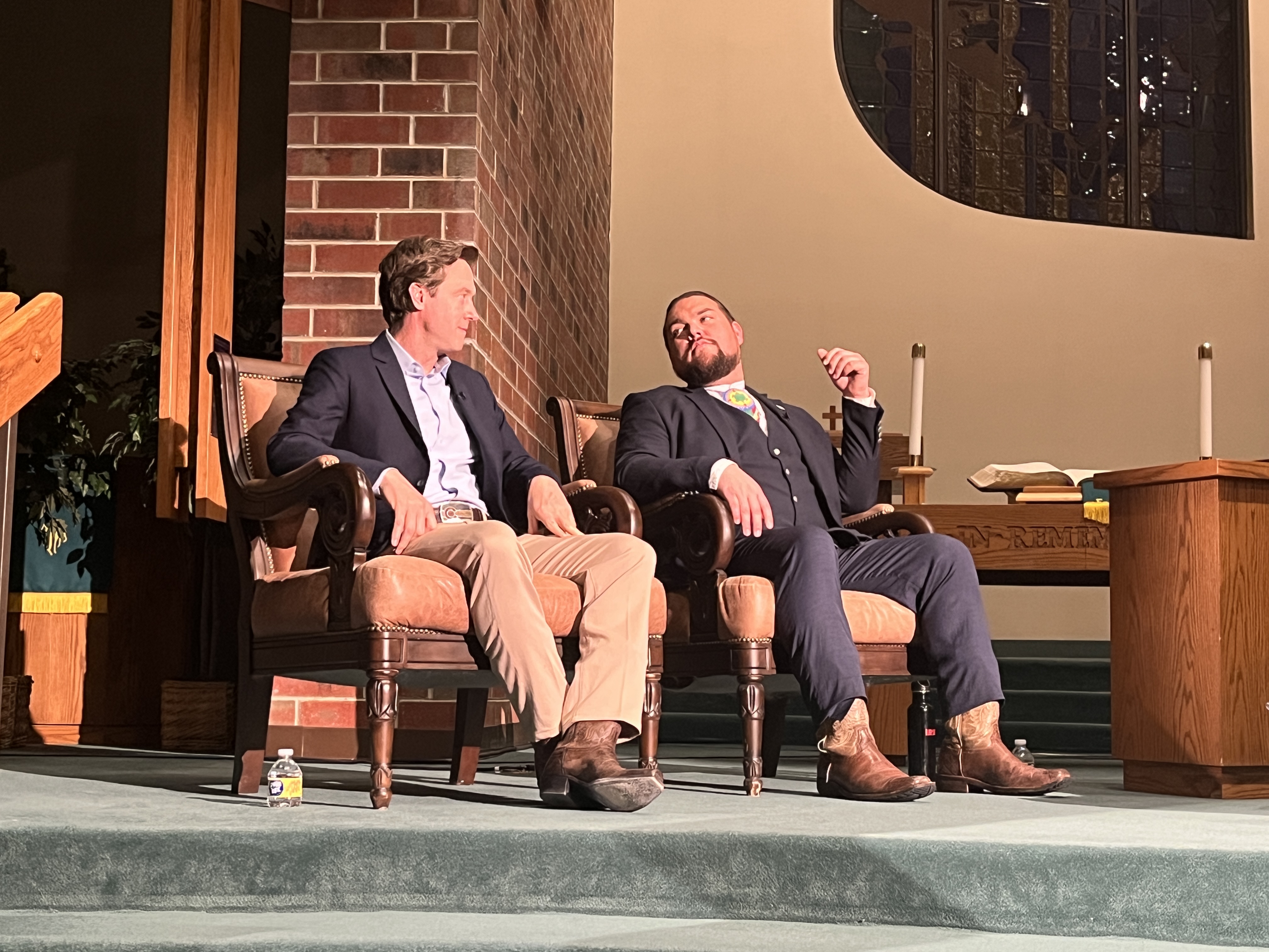 Ean Tafoya and Mike Johnston prepare for a forum hosted by PBS 12. (Alex Edwards/The Denver Gazette).