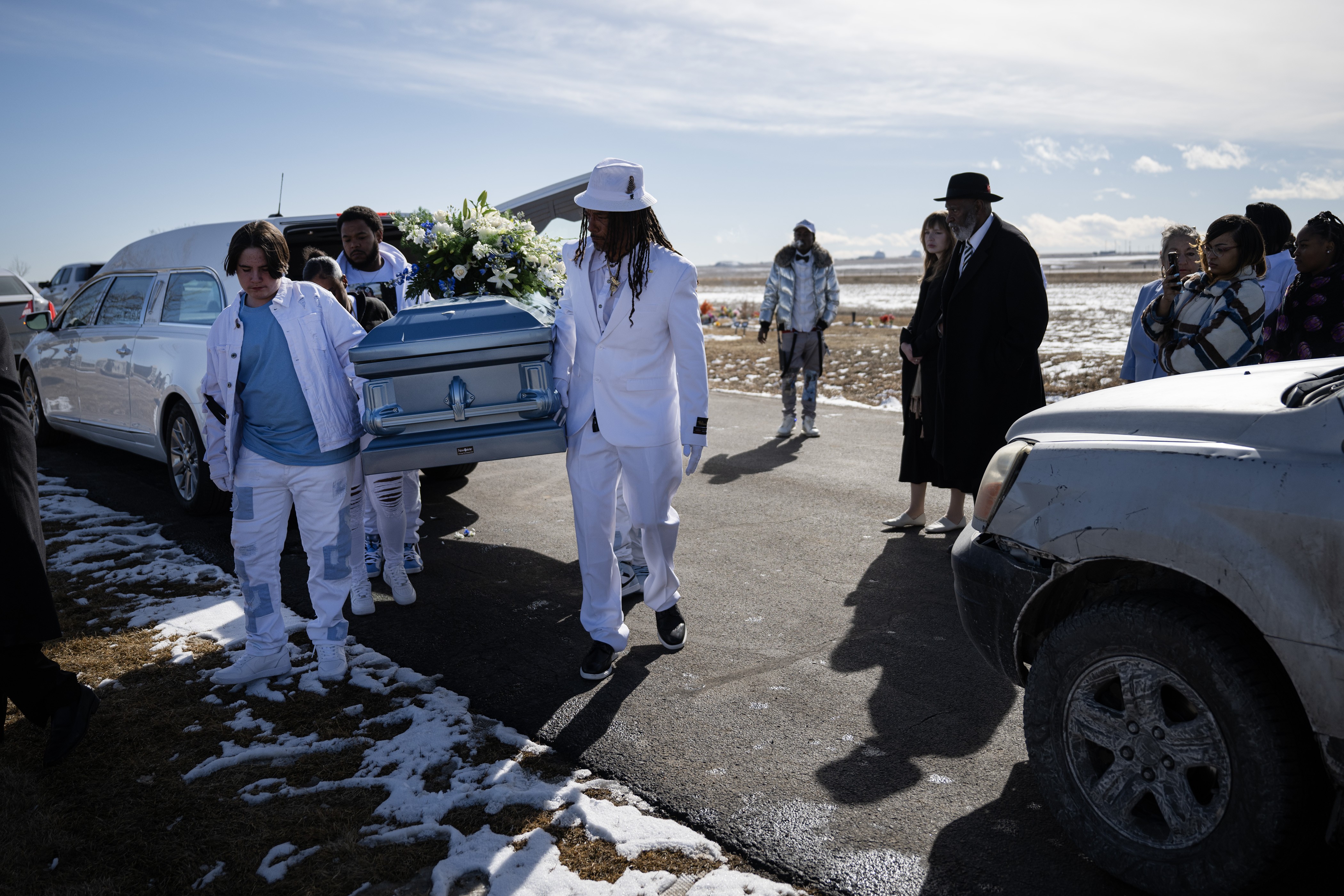 Pallbearers, lead by Elias Alexander Armstrong’s cousin and father Thomas Armstrong, carry Elias’ casket to his gravesite on Friday, Feb. 24, 2023, at St. Simeon Catholic Cemetery in Aurora. (TimHursttim.hurst@gazette.comhttps://secure.gravatar.com/avatar/aca82bd62b4ee425c598527cd6faa1b1?d=mm&r=g)